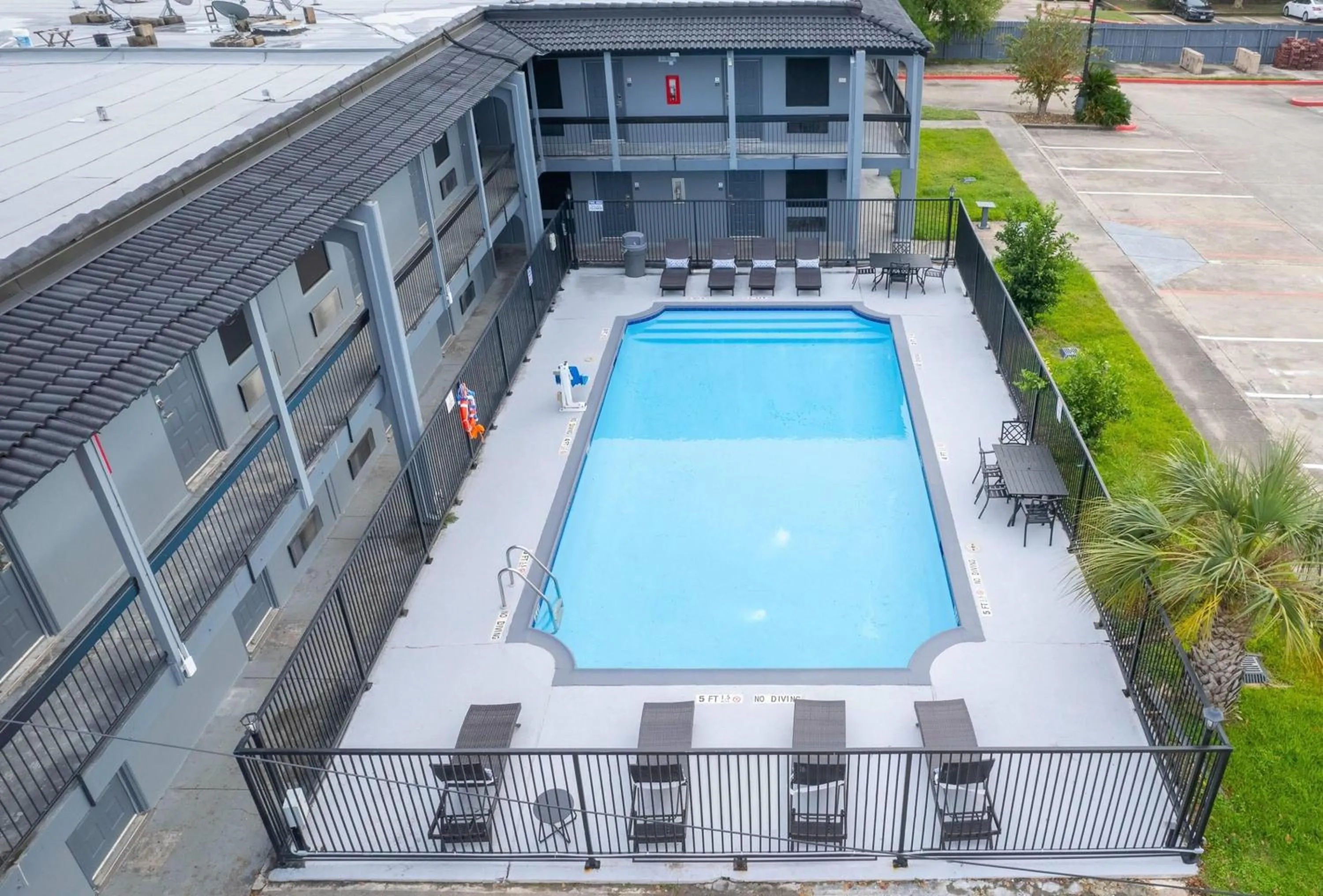 Pool view in Days Inn & Suites by Wyndham Texas City