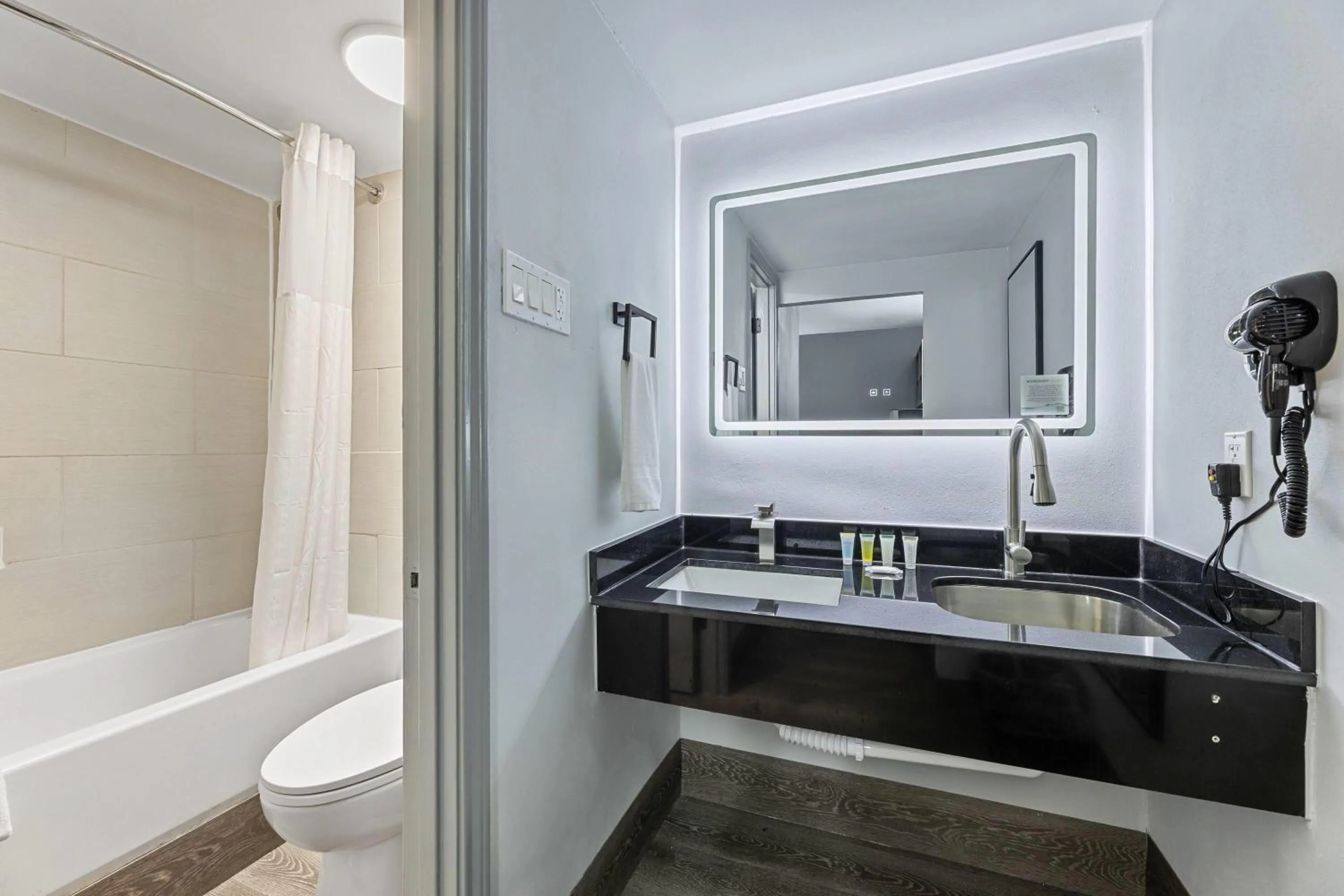 Bathroom in Days Inn & Suites by Wyndham Texas City