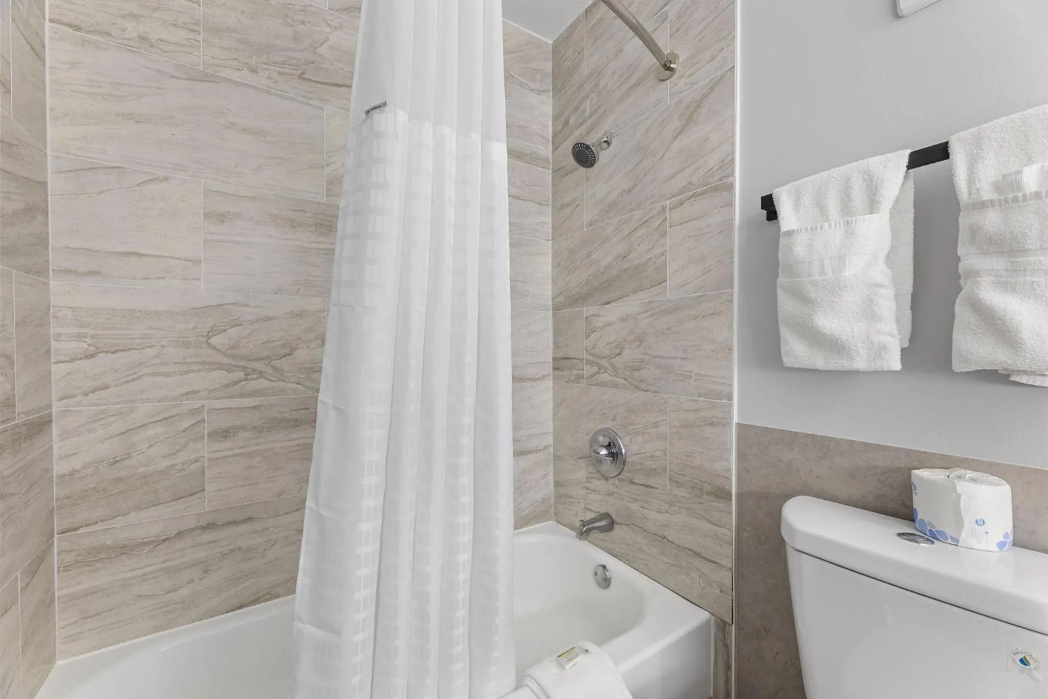 Bathroom in Days Inn & Suites by Wyndham Texas City