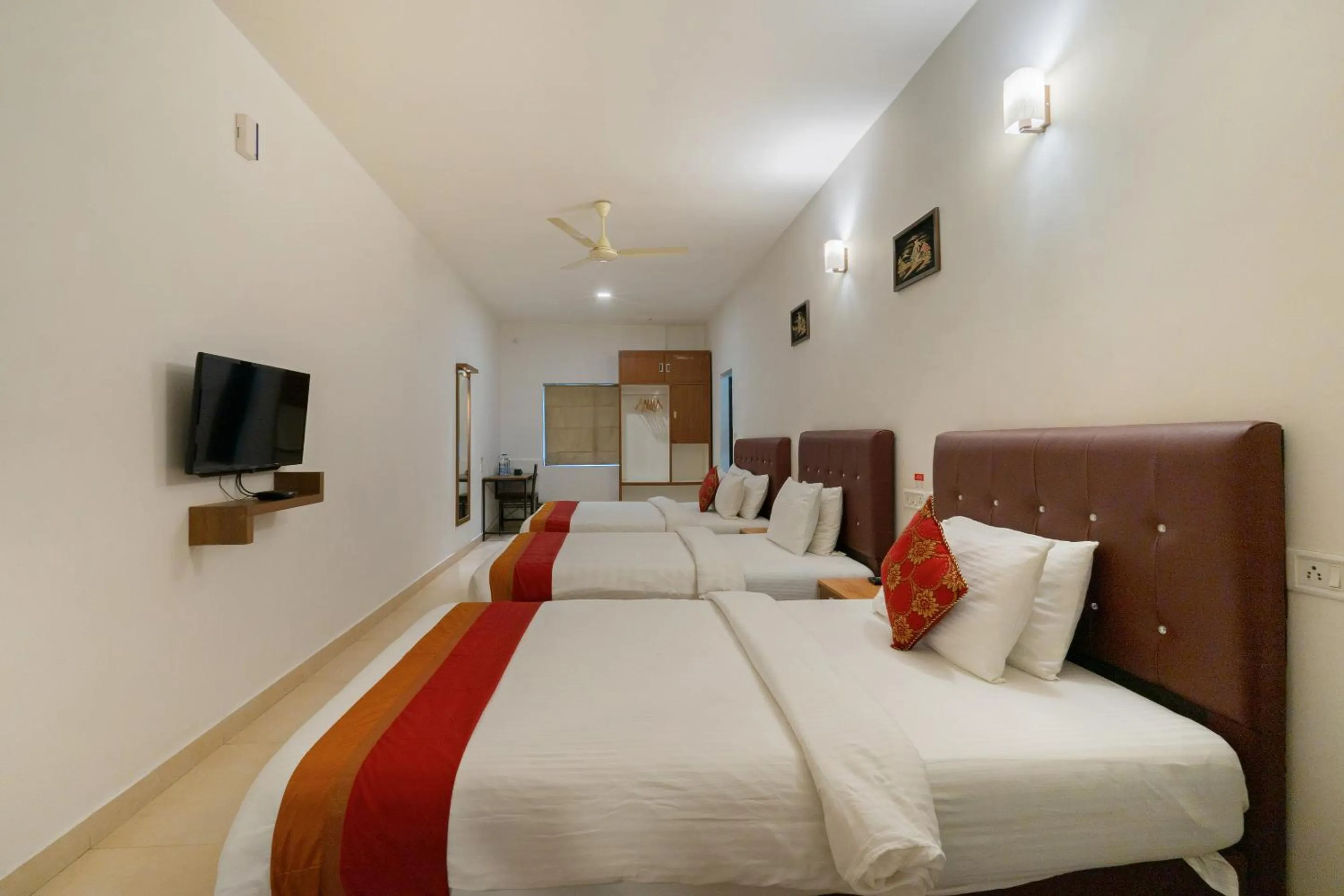 Bed in The Sanihara Hotel & Resort