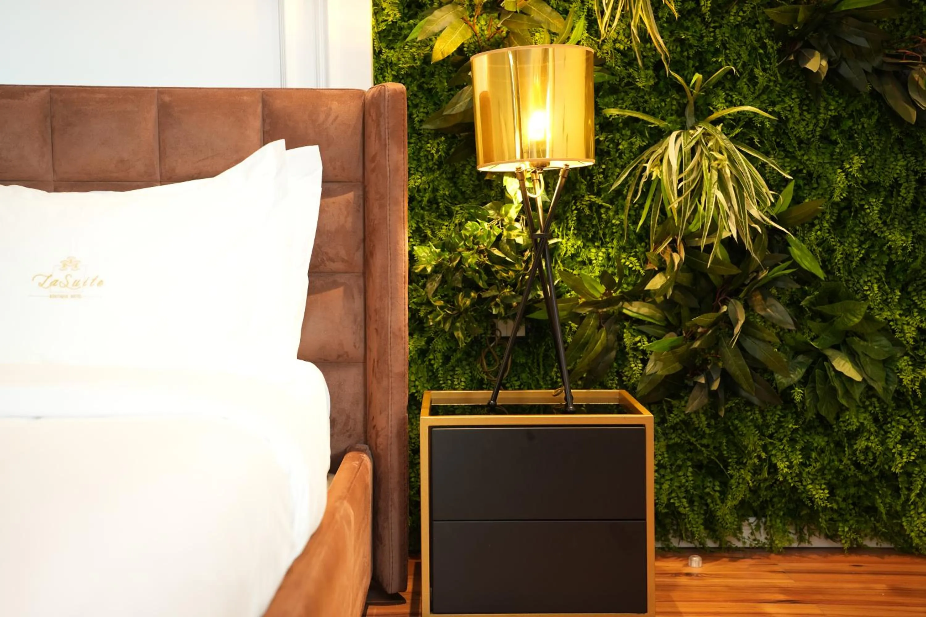 Bed in La Suite Boutique Hotel