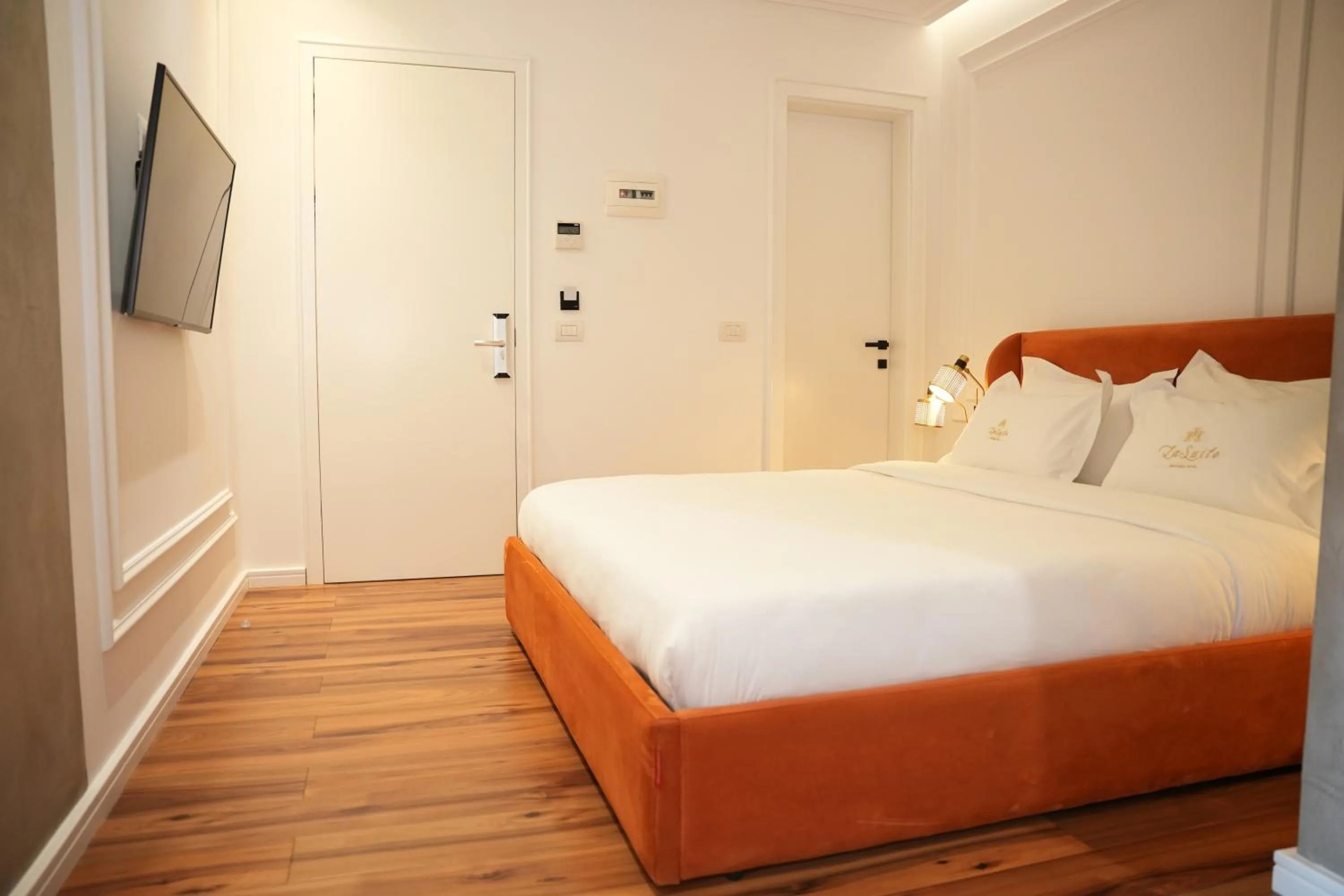 Bed in La Suite Boutique Hotel