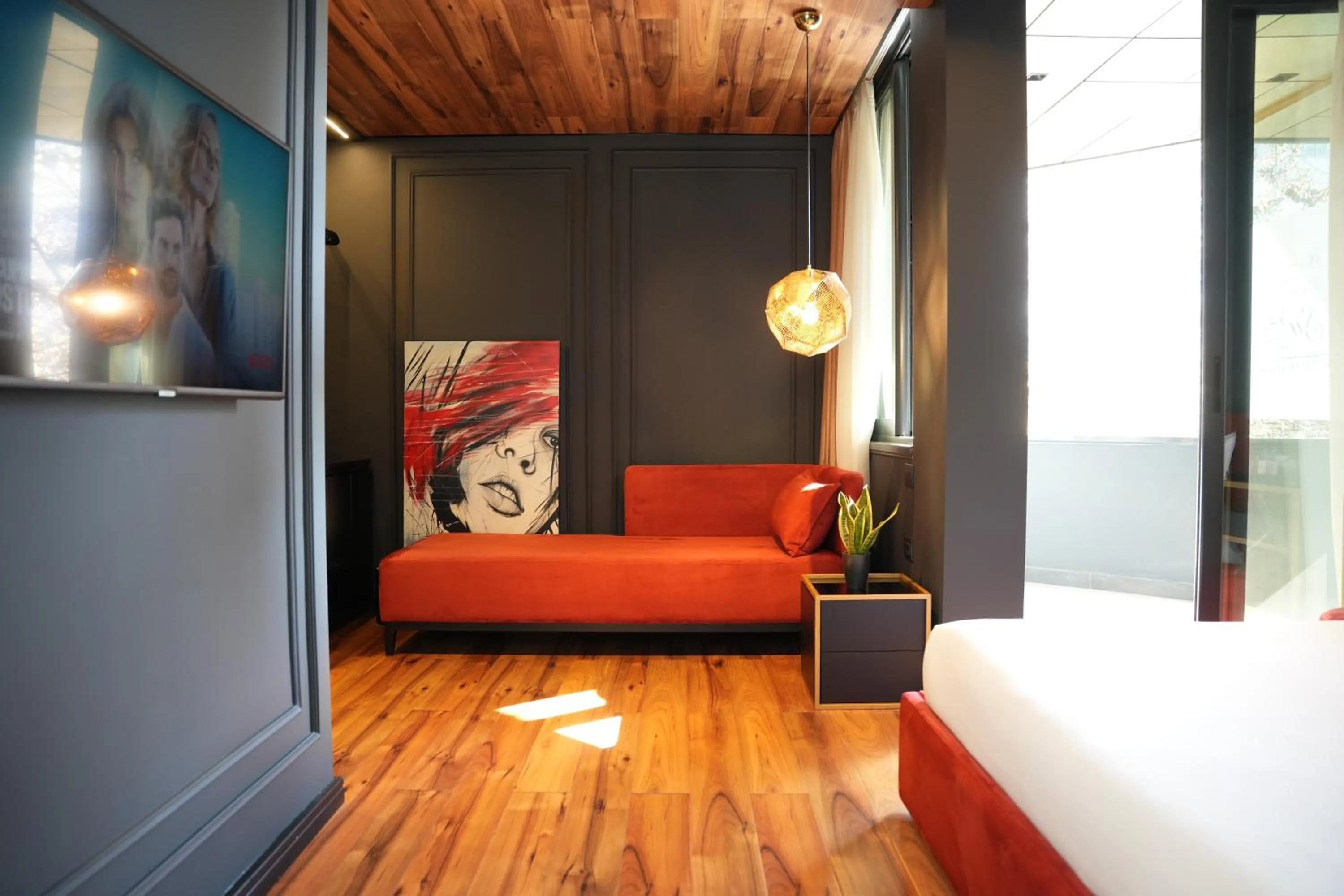 Bed in La Suite Boutique Hotel