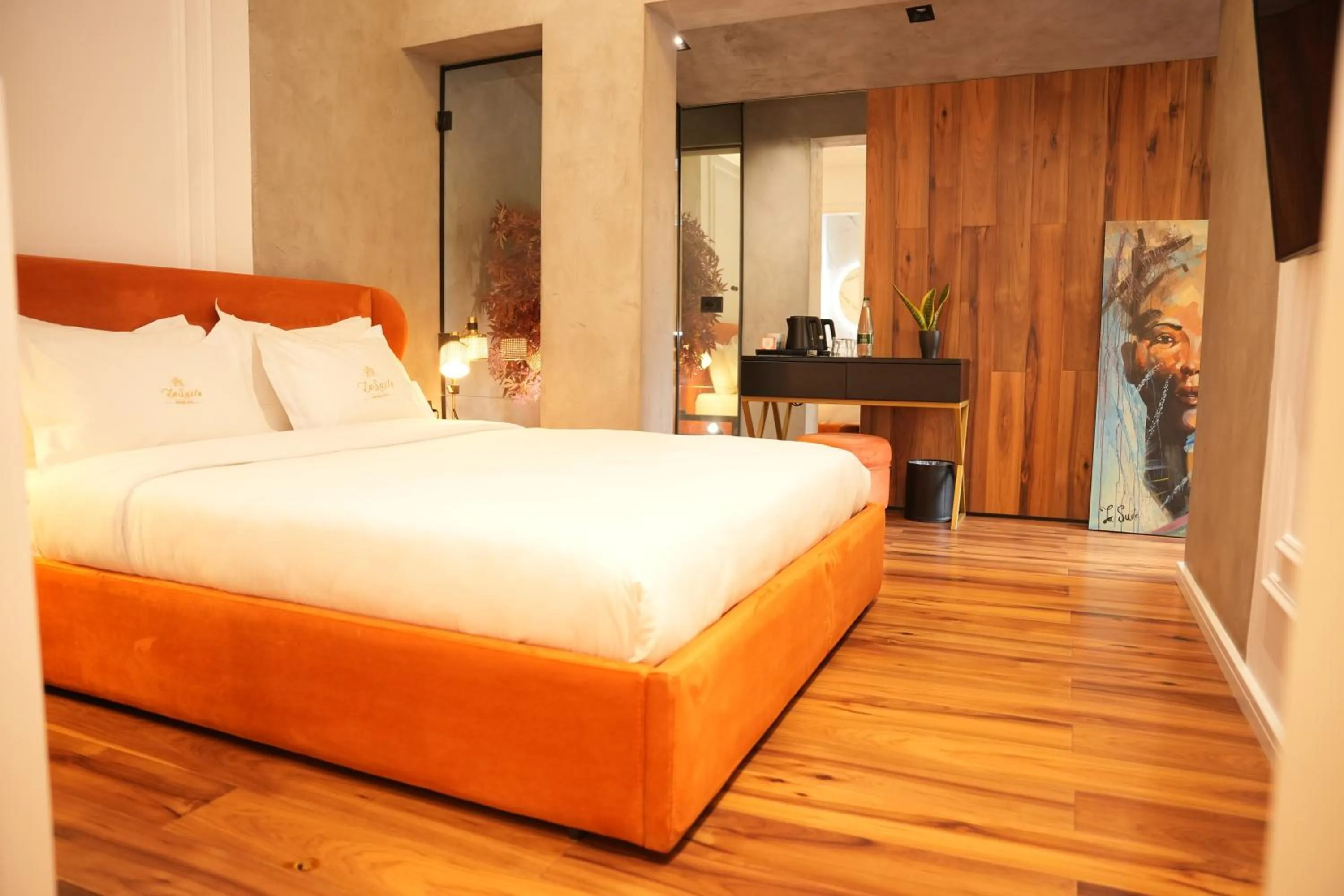 Bed in La Suite Boutique Hotel