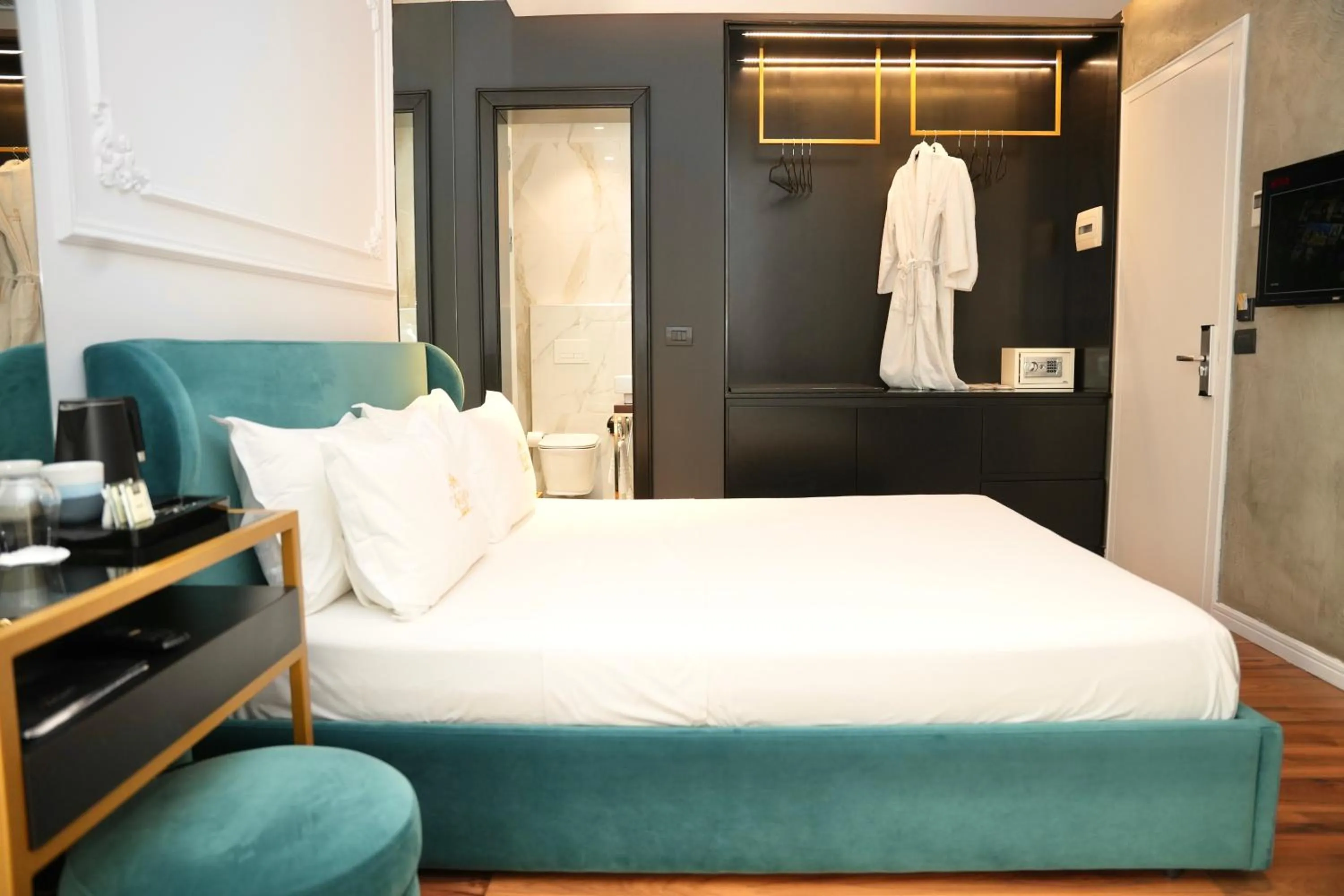 Bed in La Suite Boutique Hotel