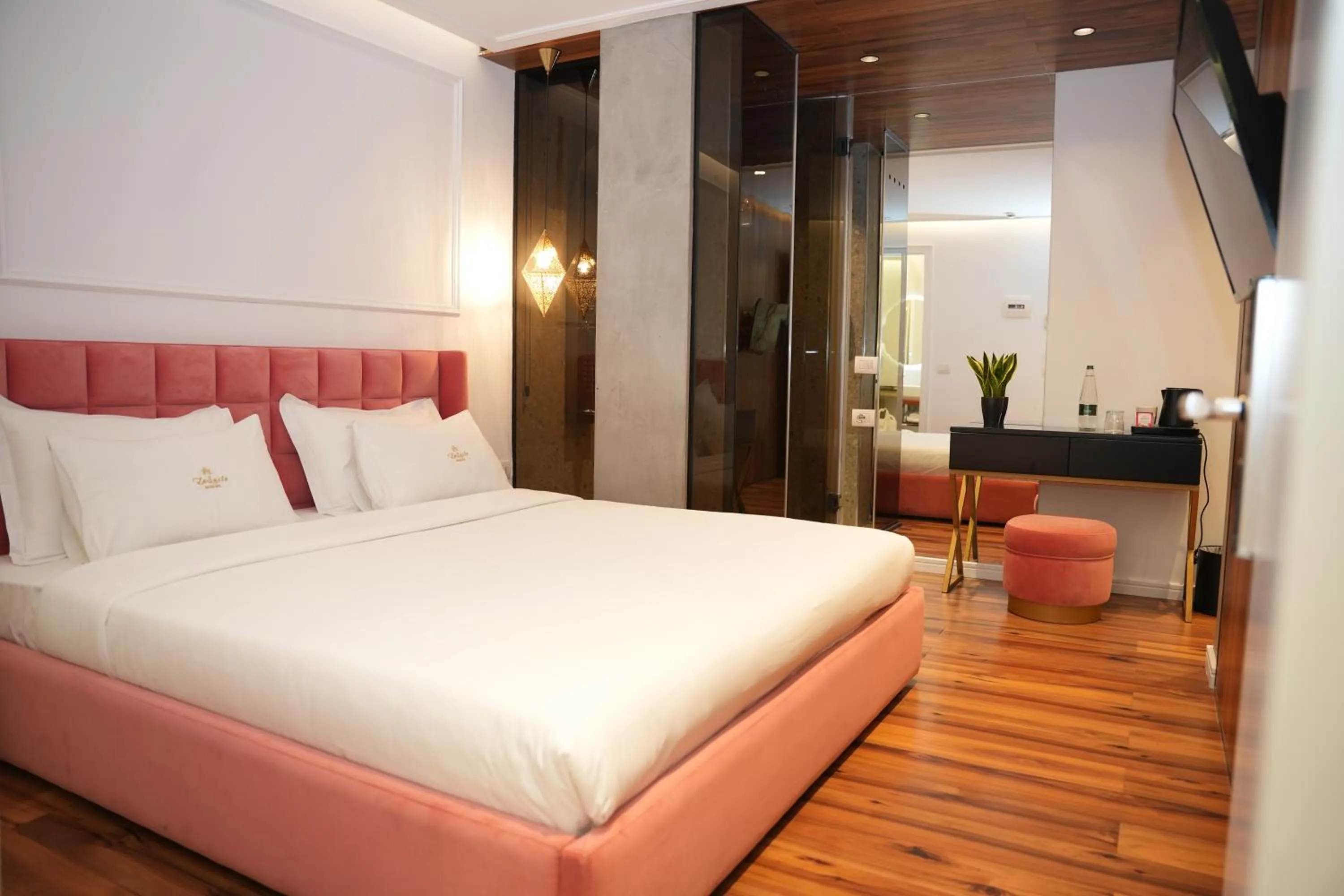 Bed in La Suite Boutique Hotel