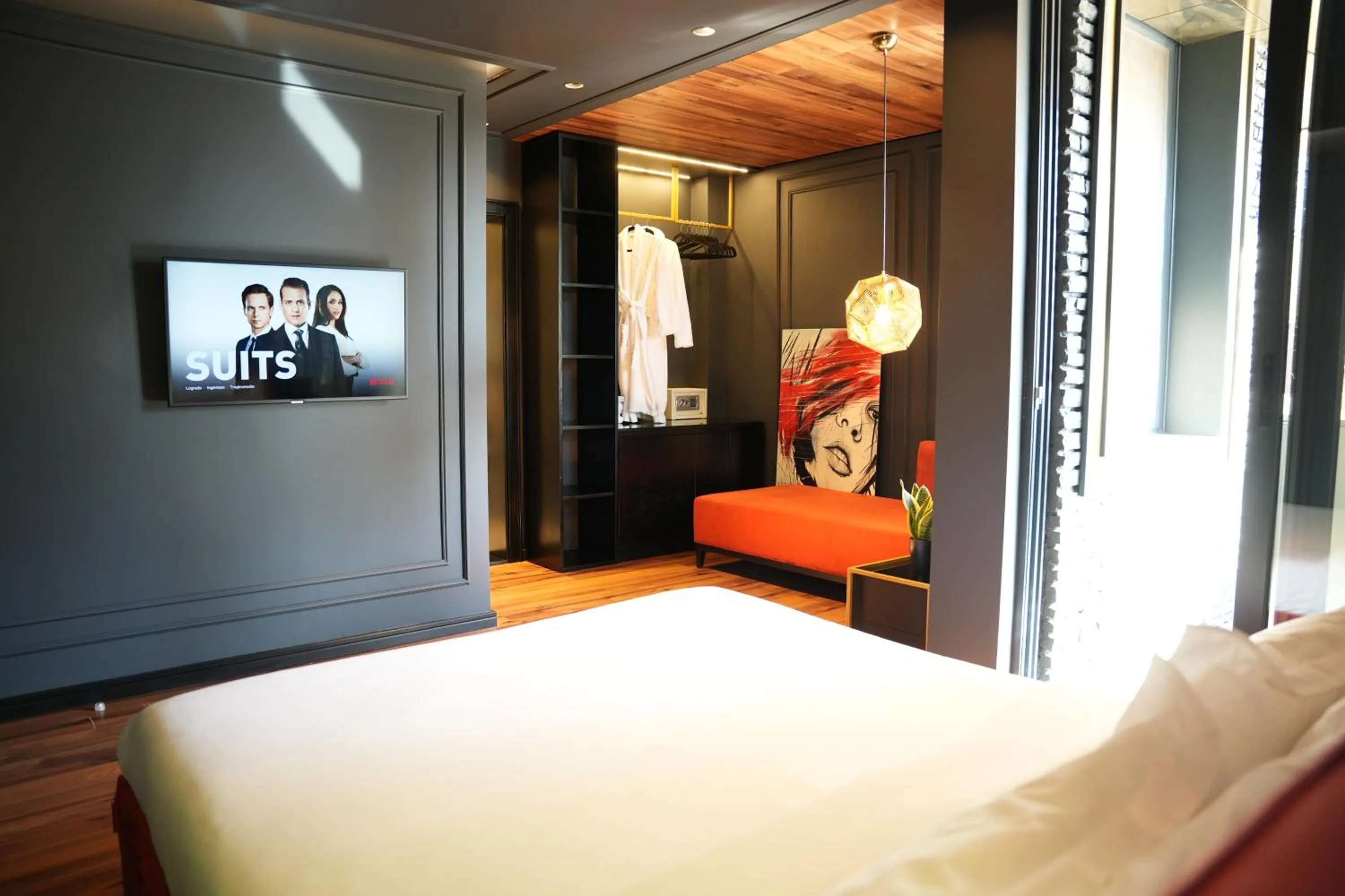 Bed in La Suite Boutique Hotel