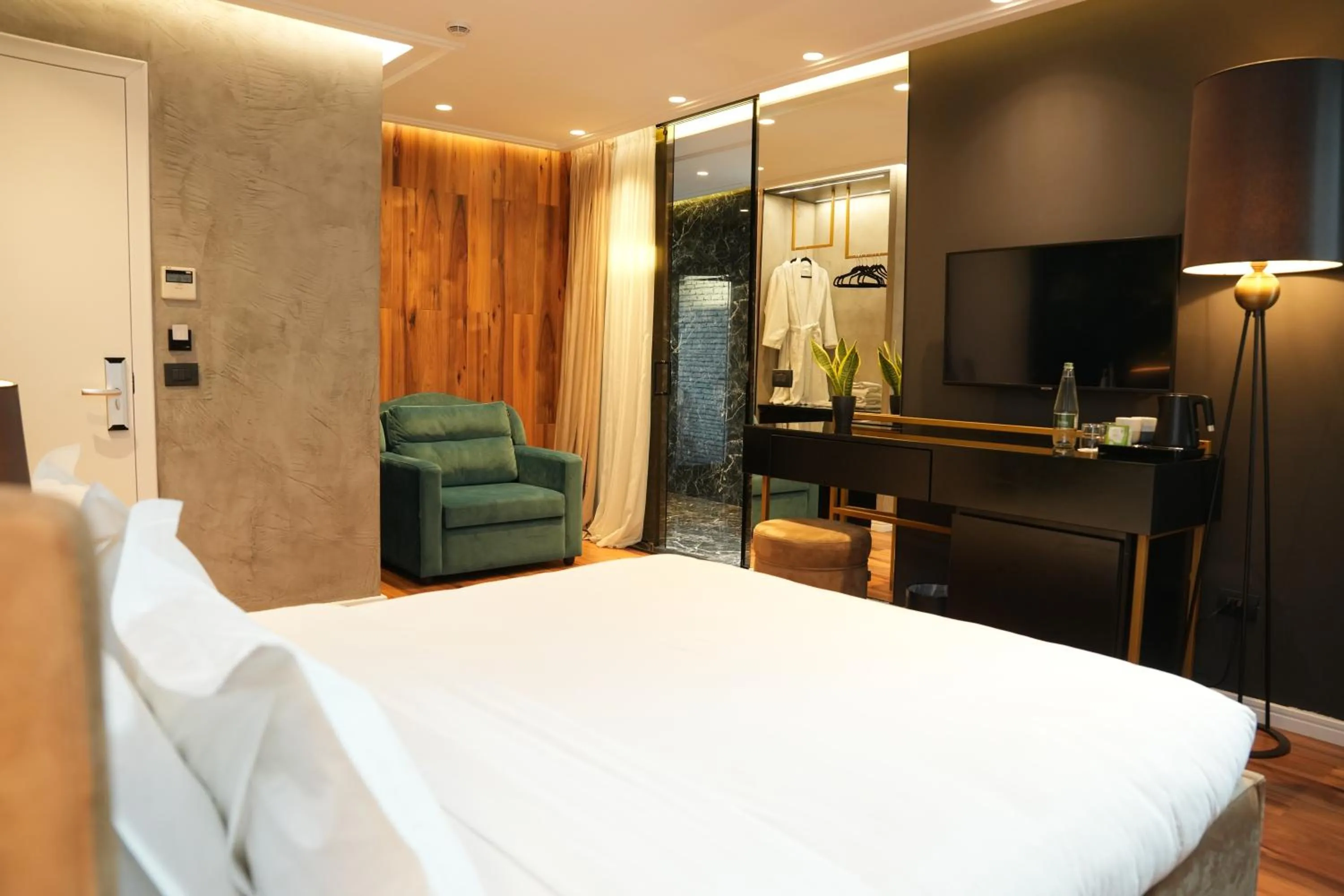 Bed in La Suite Boutique Hotel