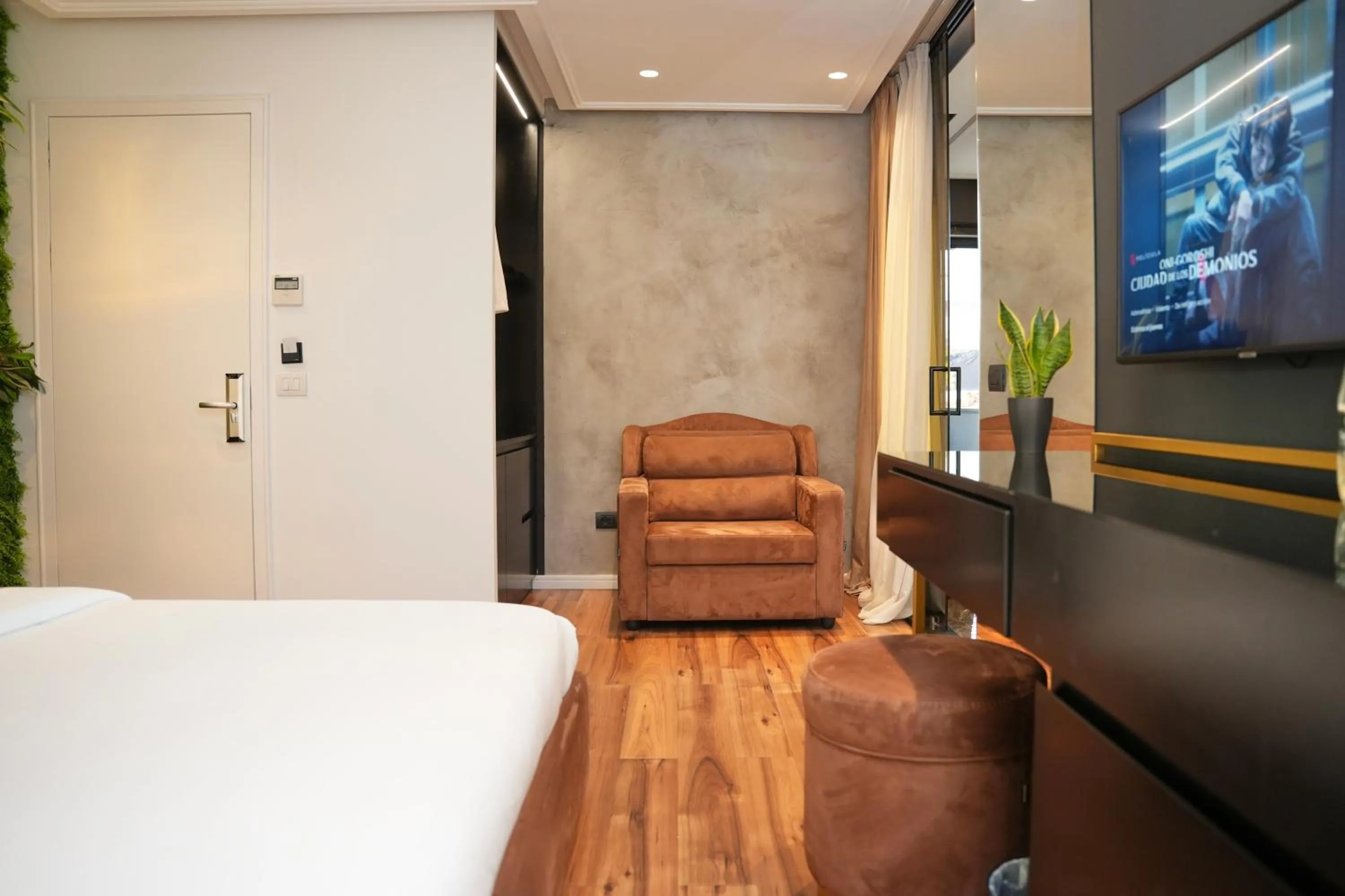 Bed in La Suite Boutique Hotel