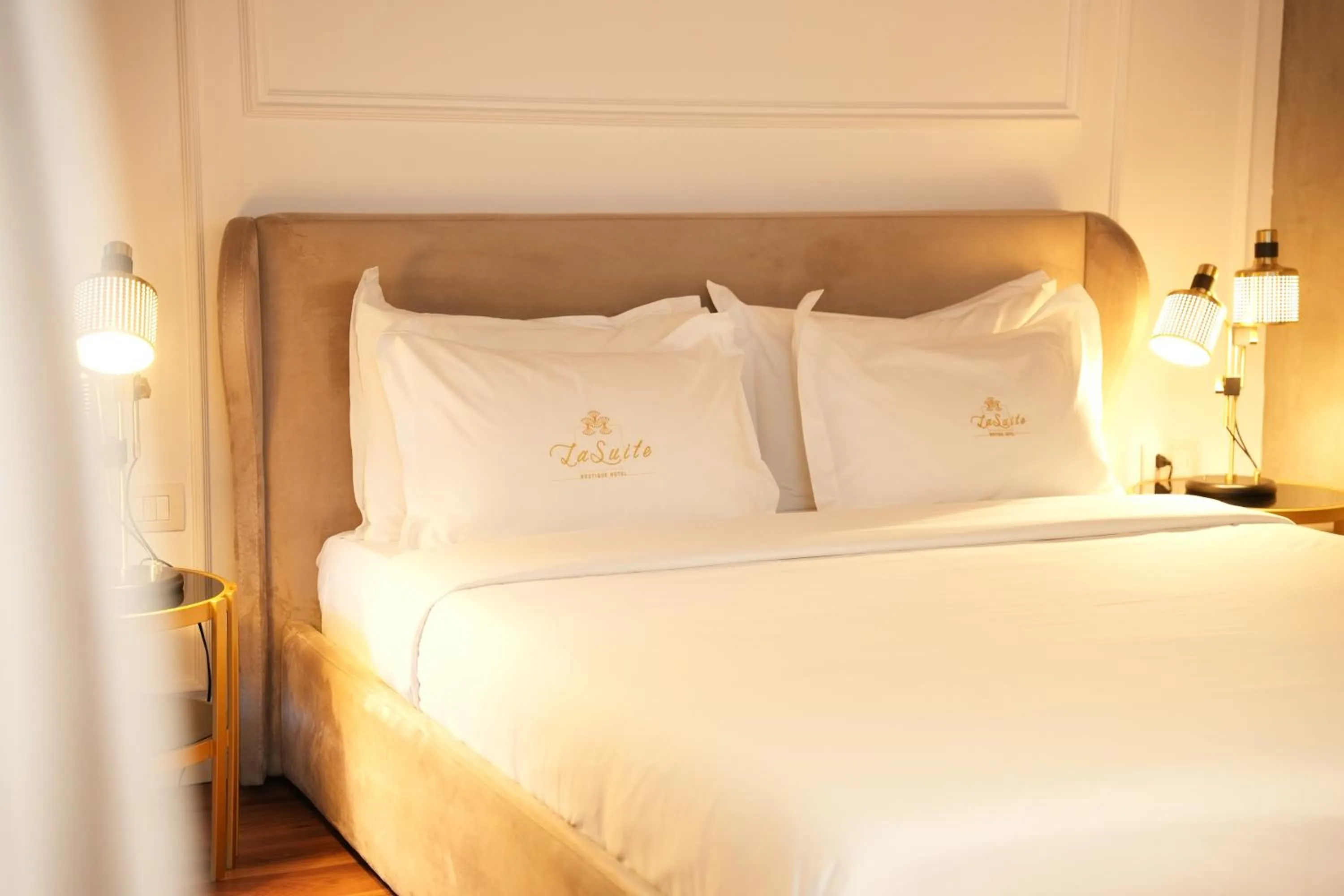 Bed in La Suite Boutique Hotel