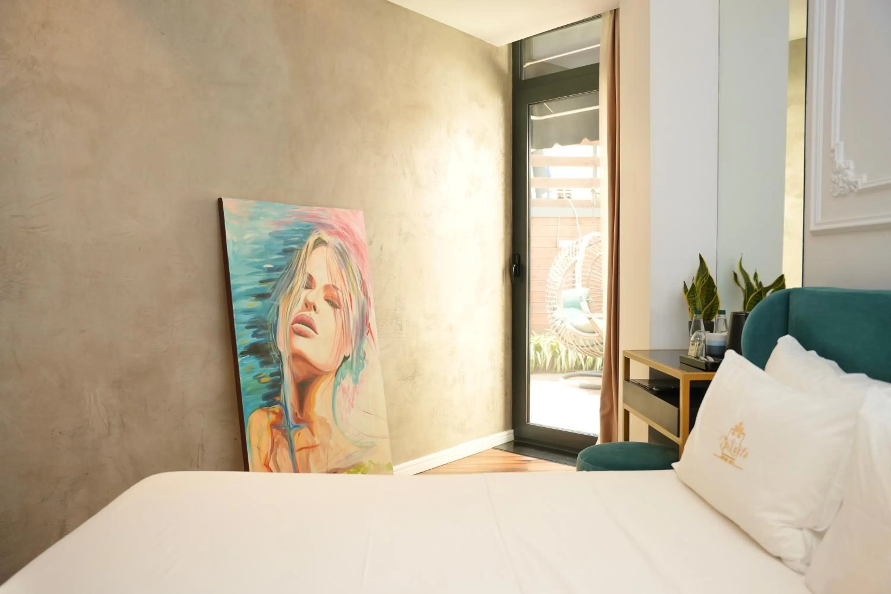 Bed in La Suite Boutique Hotel