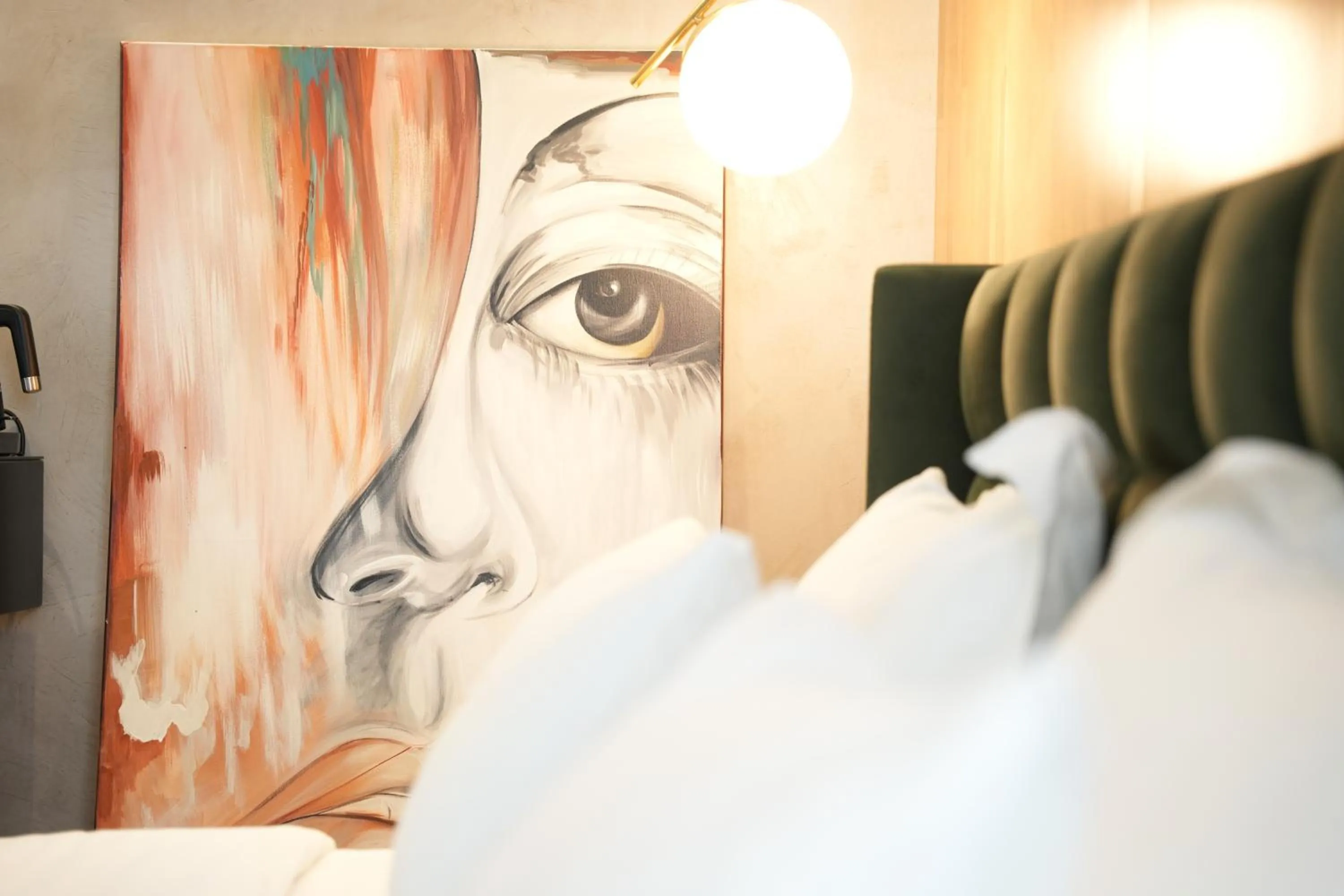 Bed in La Suite Boutique Hotel