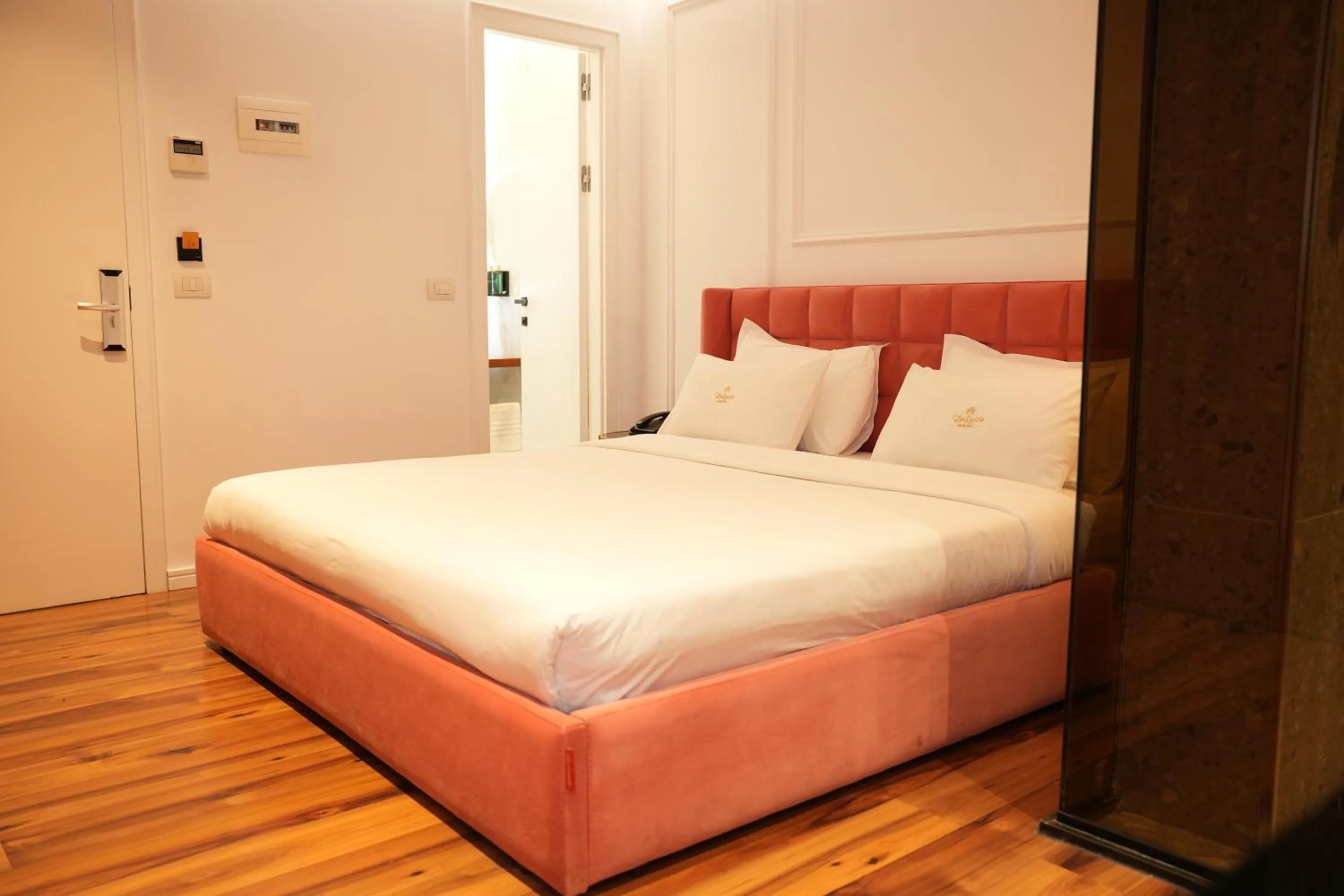 Bed in La Suite Boutique Hotel