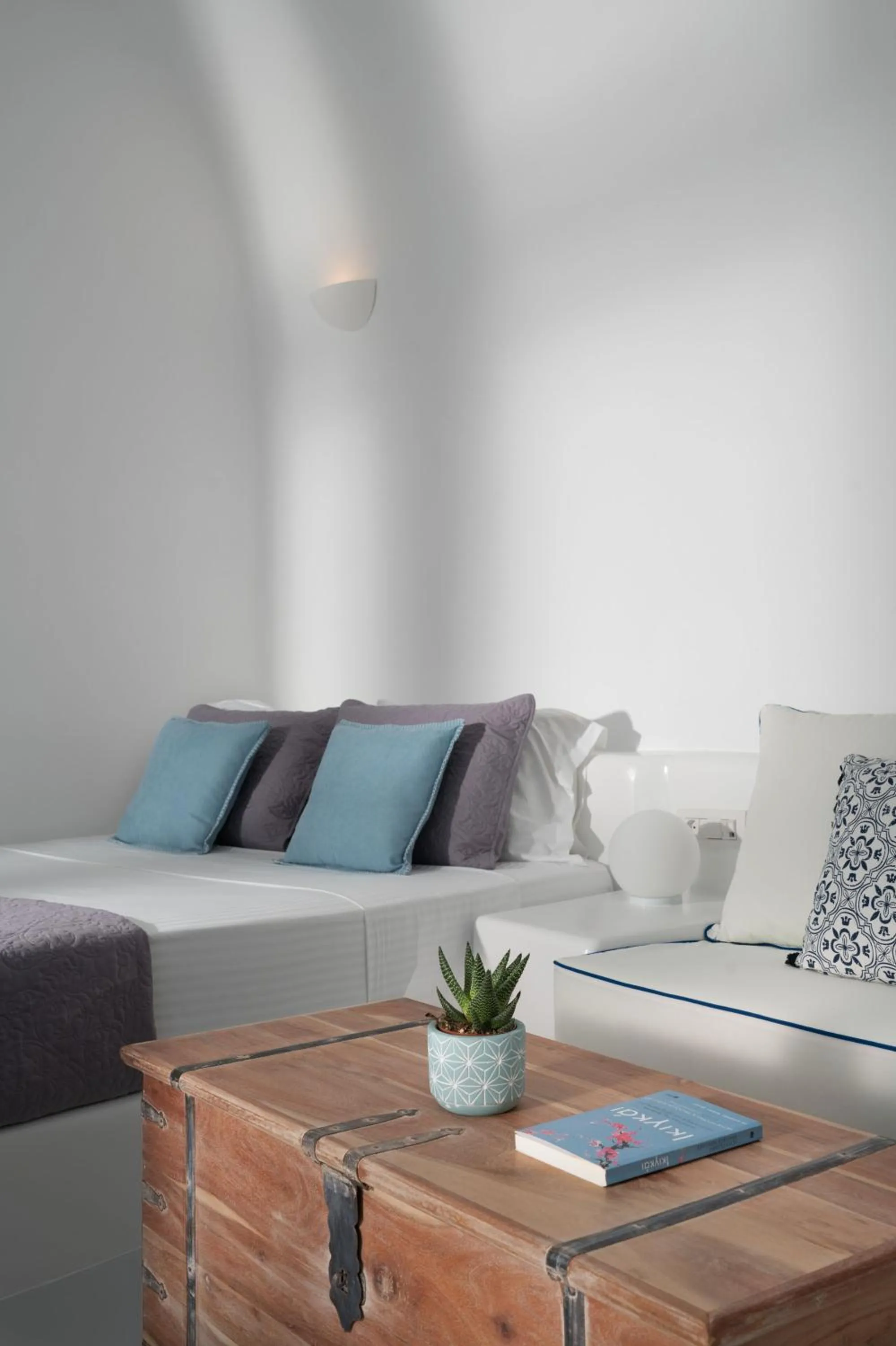 Seating area, Bed in Oia Spirit Boutique Residences