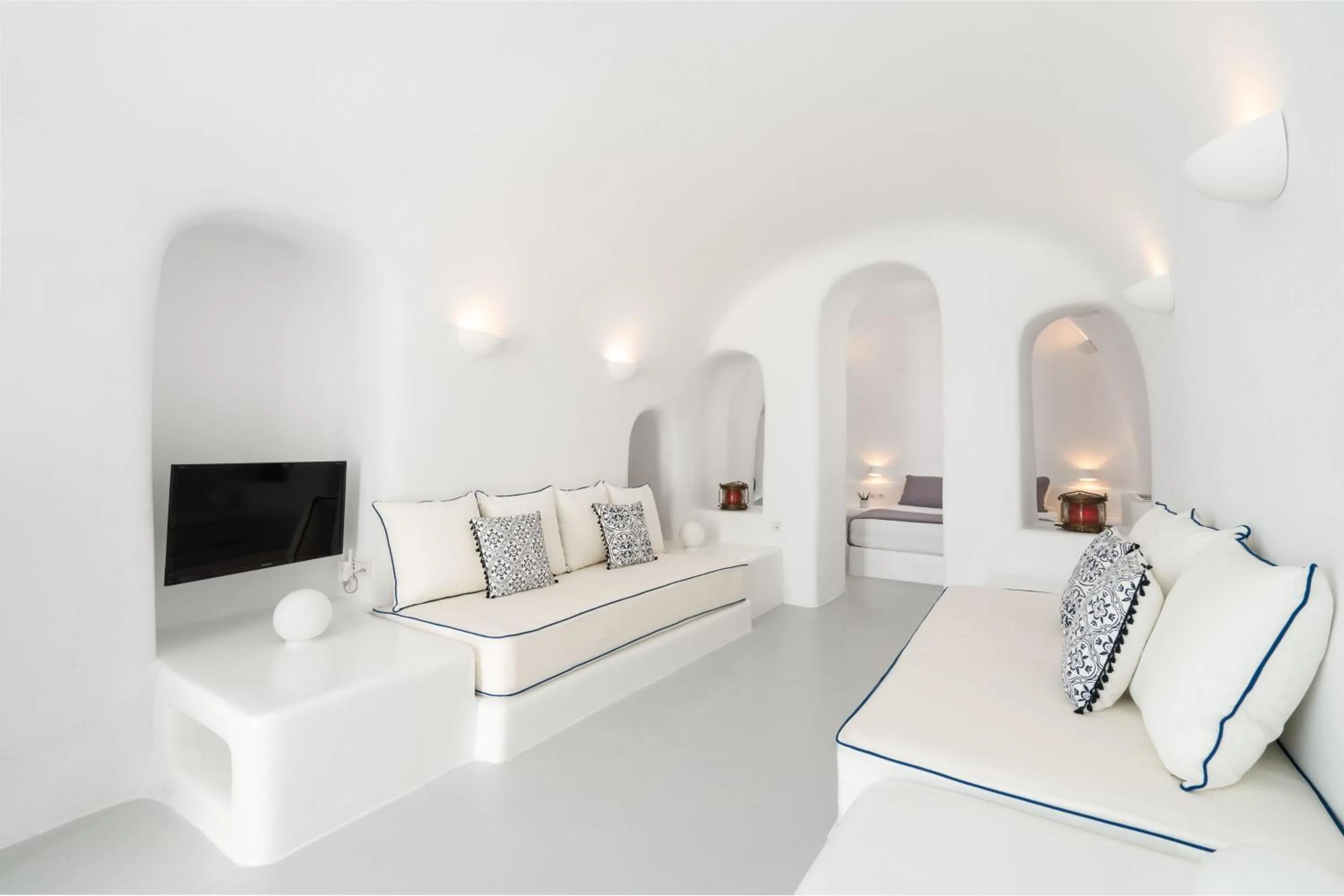 Seating area, Bed in Oia Spirit Boutique Residences