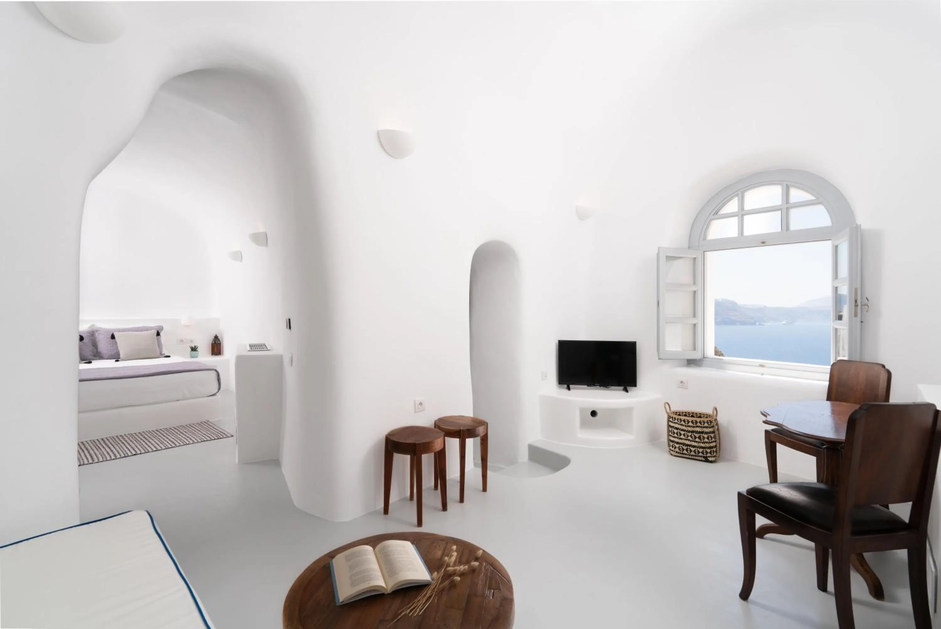 Seating area, Bed in Oia Spirit Boutique Residences