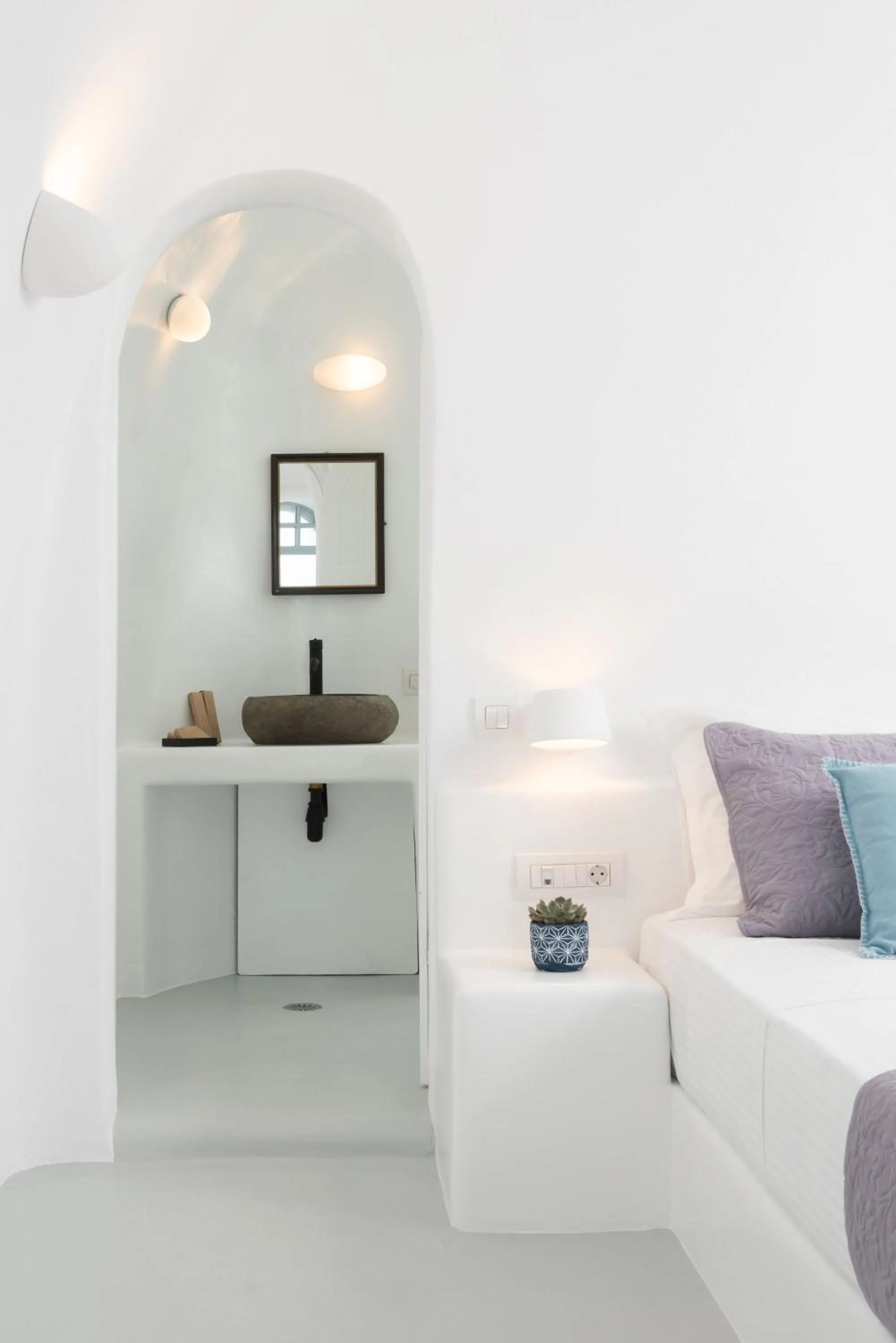 Seating area, Bed in Oia Spirit Boutique Residences