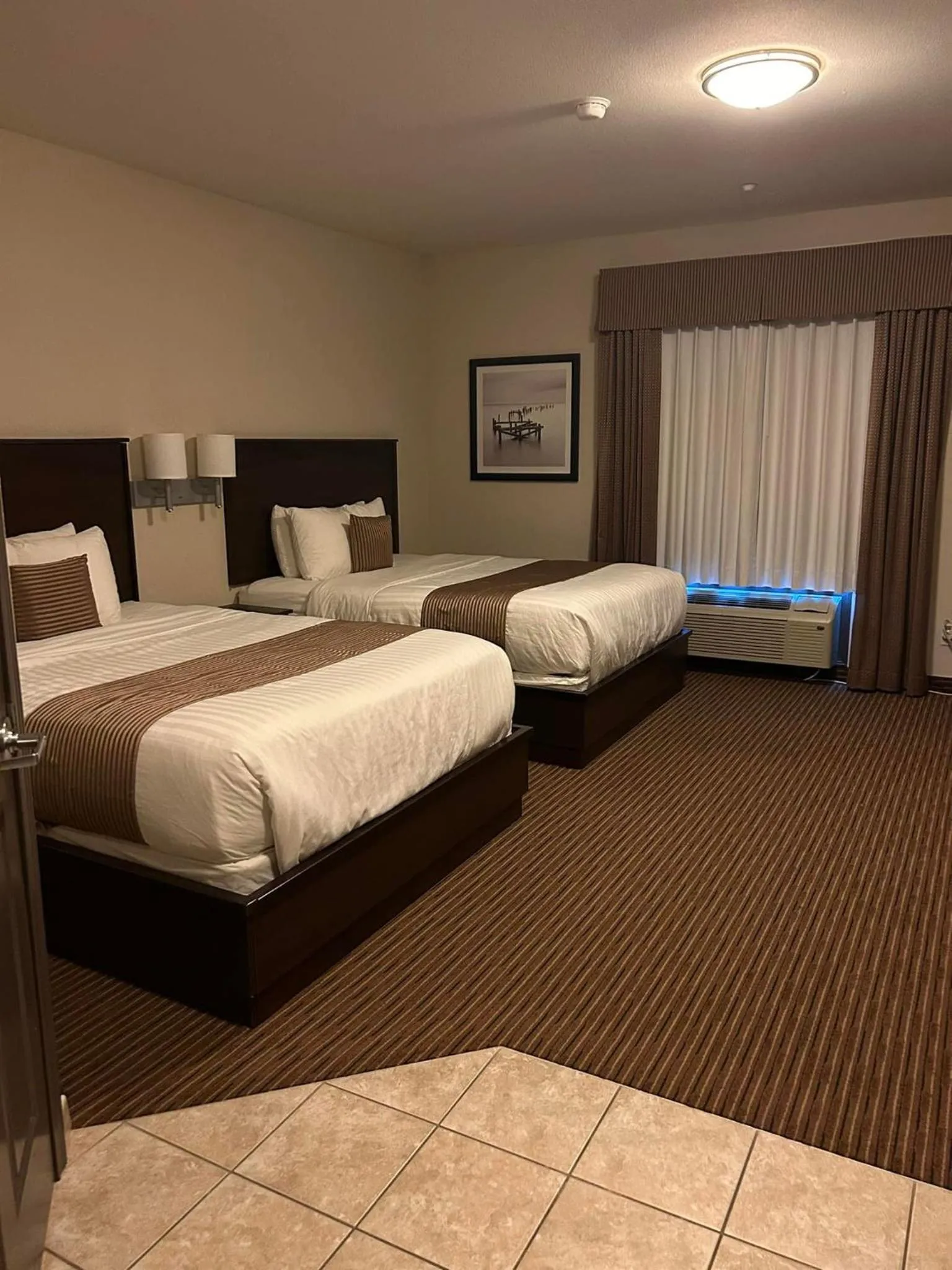 Bed in Travelodge Suites by Wyndham Estevan