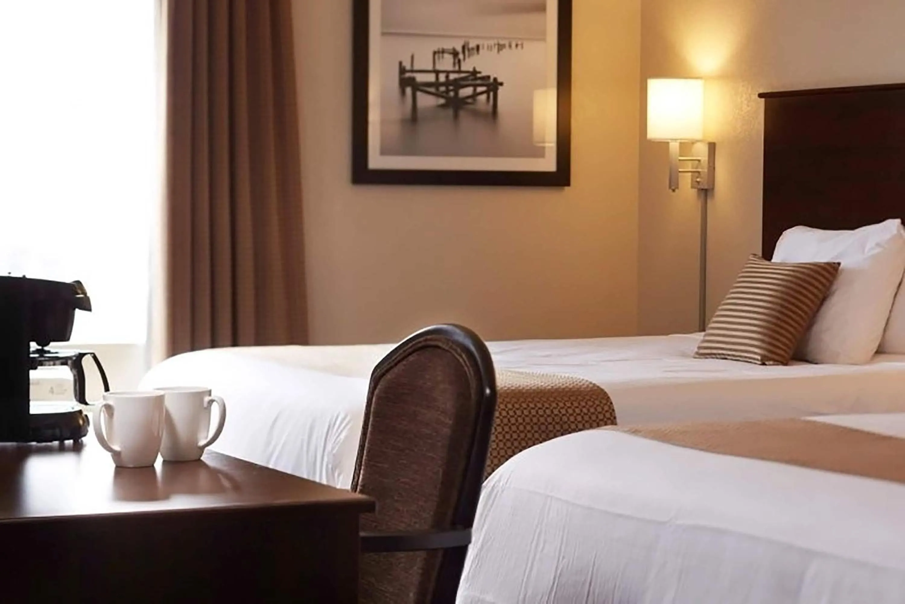 Photo of the whole room, Bed in Travelodge Suites by Wyndham Estevan