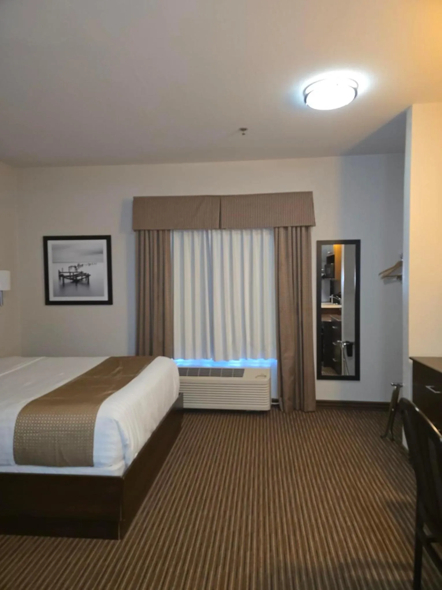 Bed in Travelodge Suites by Wyndham Estevan