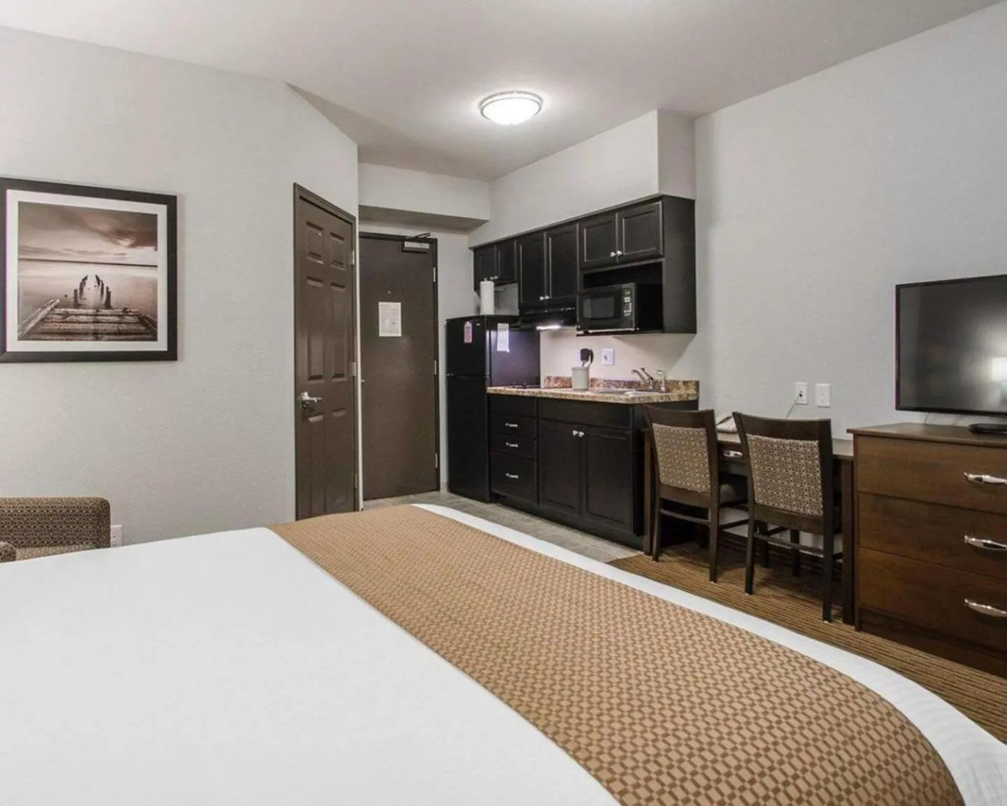 Bed in Travelodge Suites by Wyndham Estevan