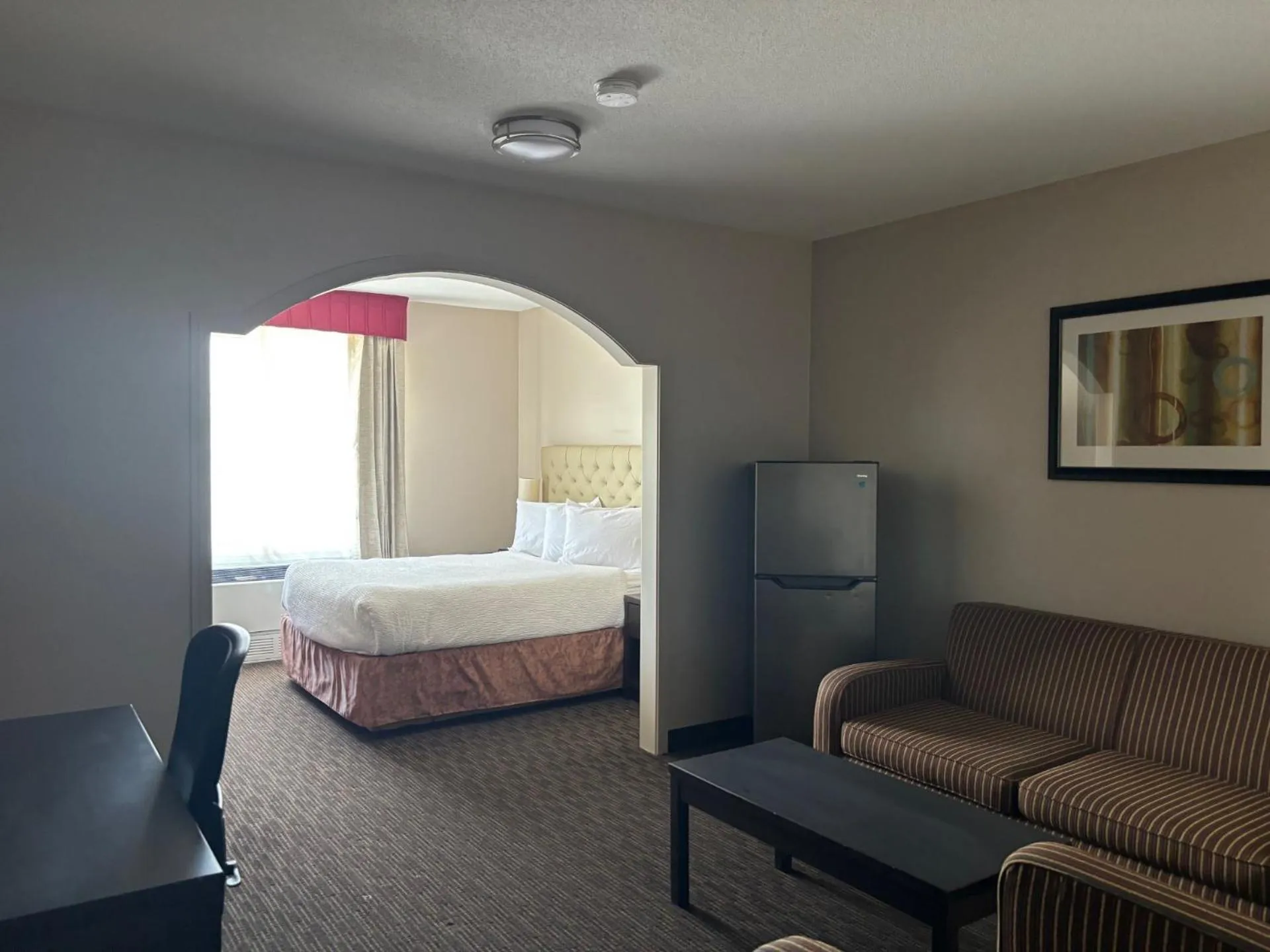 Photo of the whole room, Bed in Ramada by Wyndham Estevan