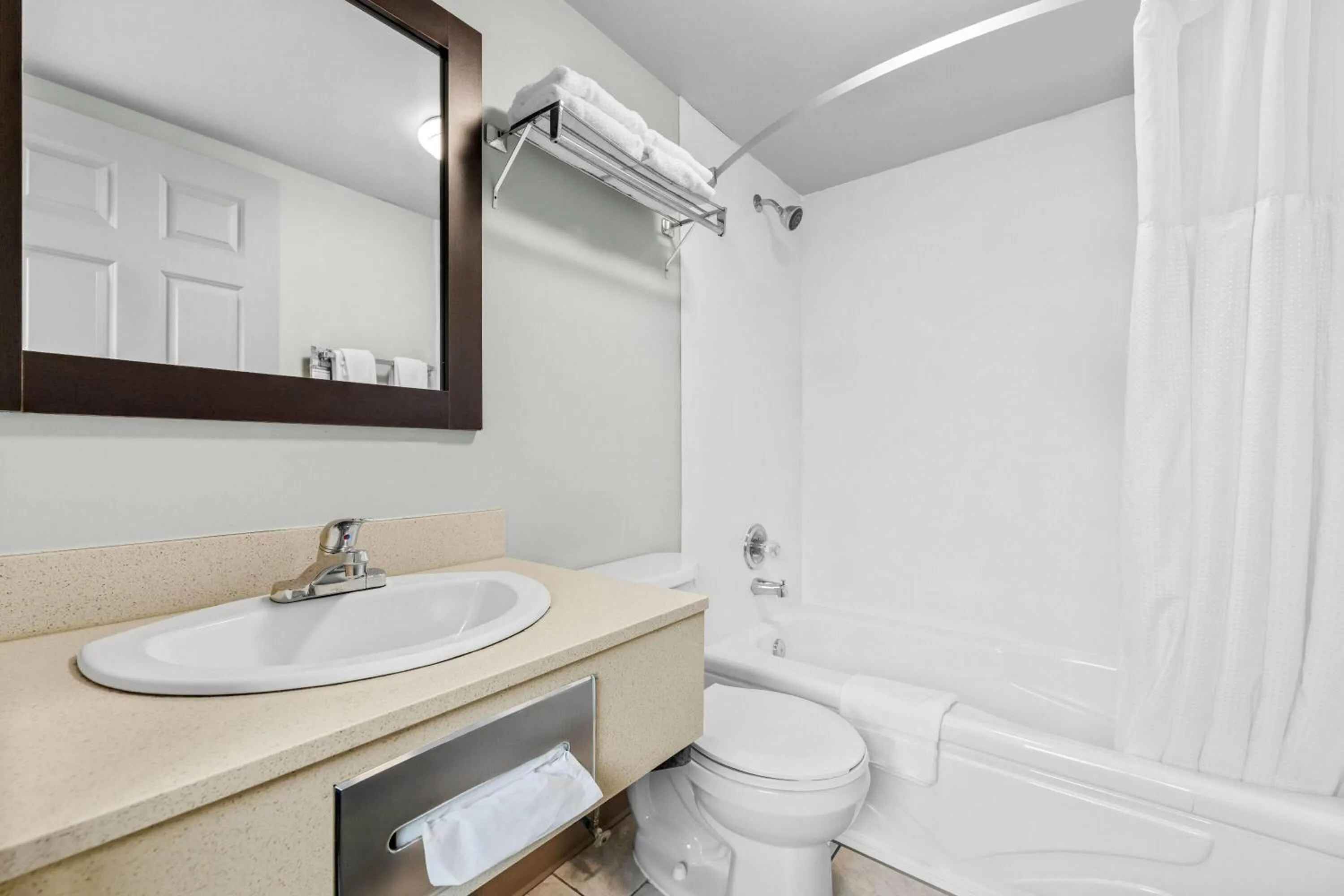 Bathroom in Super 8 by Wyndham Saskatoon Near Saskatoon Airport