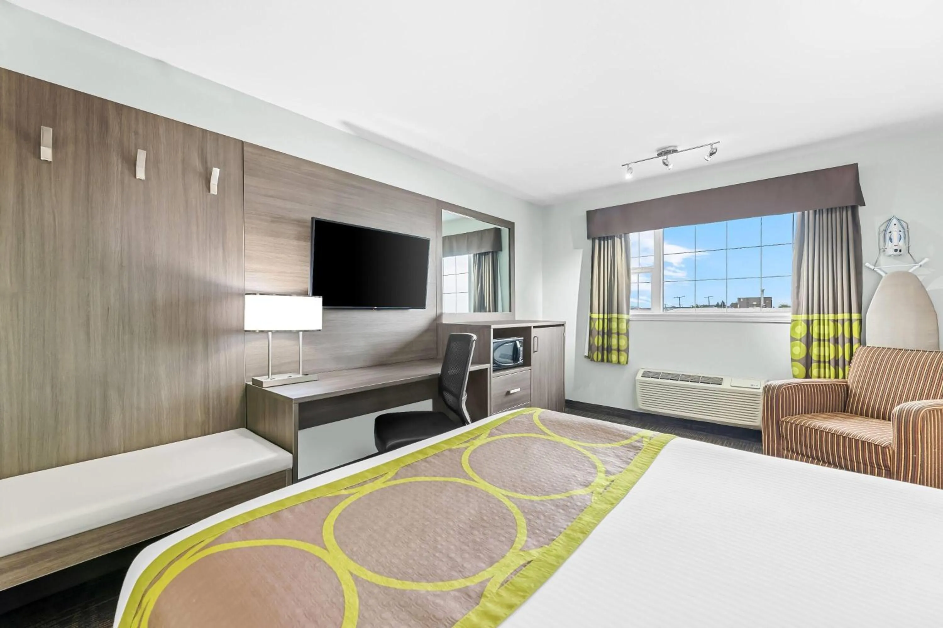 Bed in Super 8 by Wyndham Saskatoon Near Saskatoon Airport