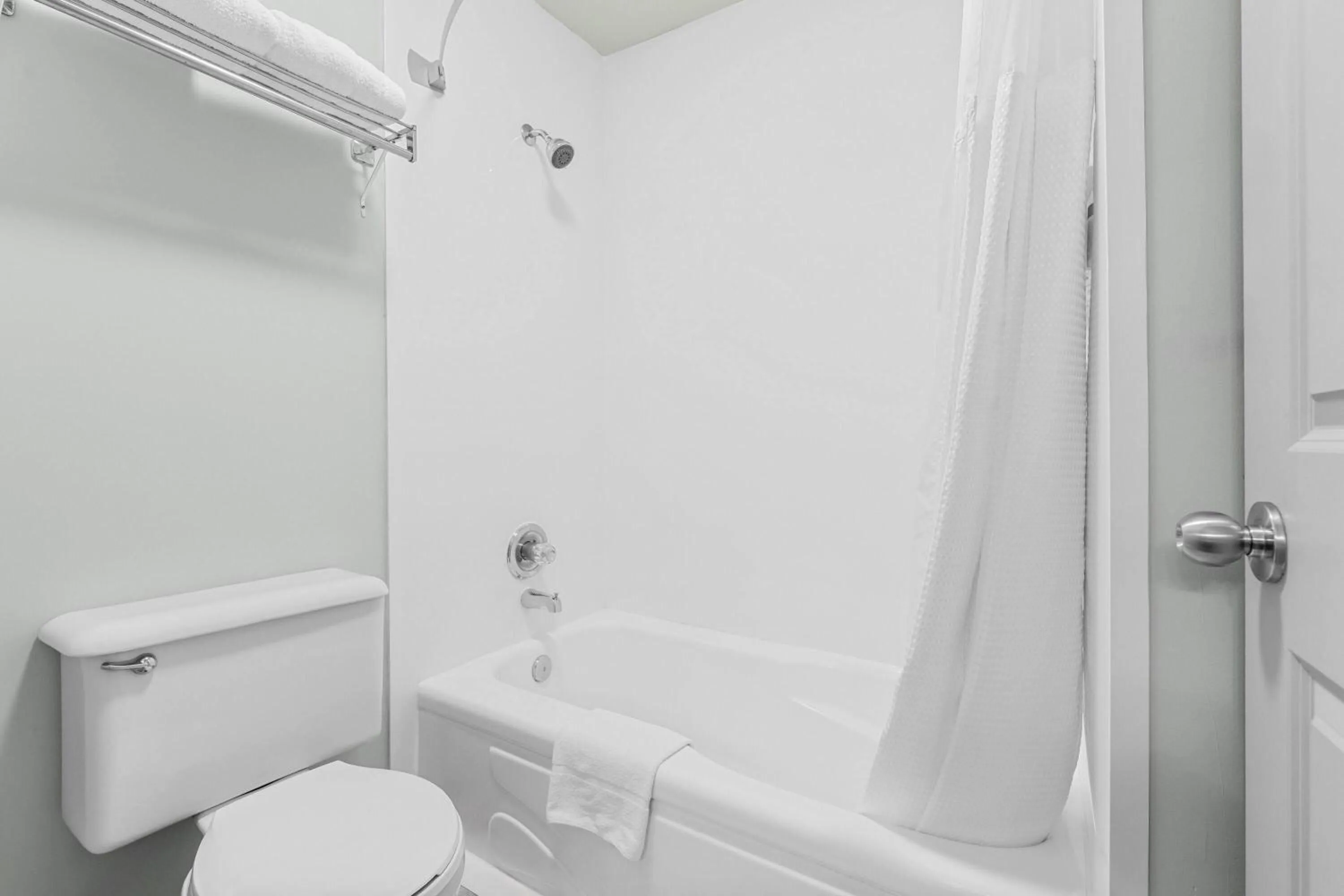 Bathroom in Super 8 by Wyndham Saskatoon Near Saskatoon Airport