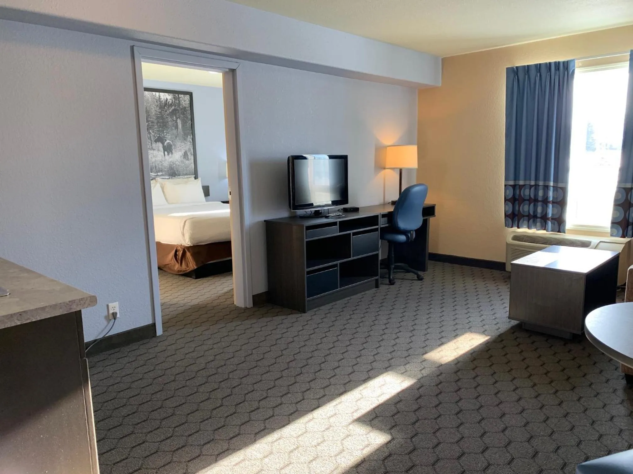 Seating area, Bed in Super 8 by Wyndham Swan River MB