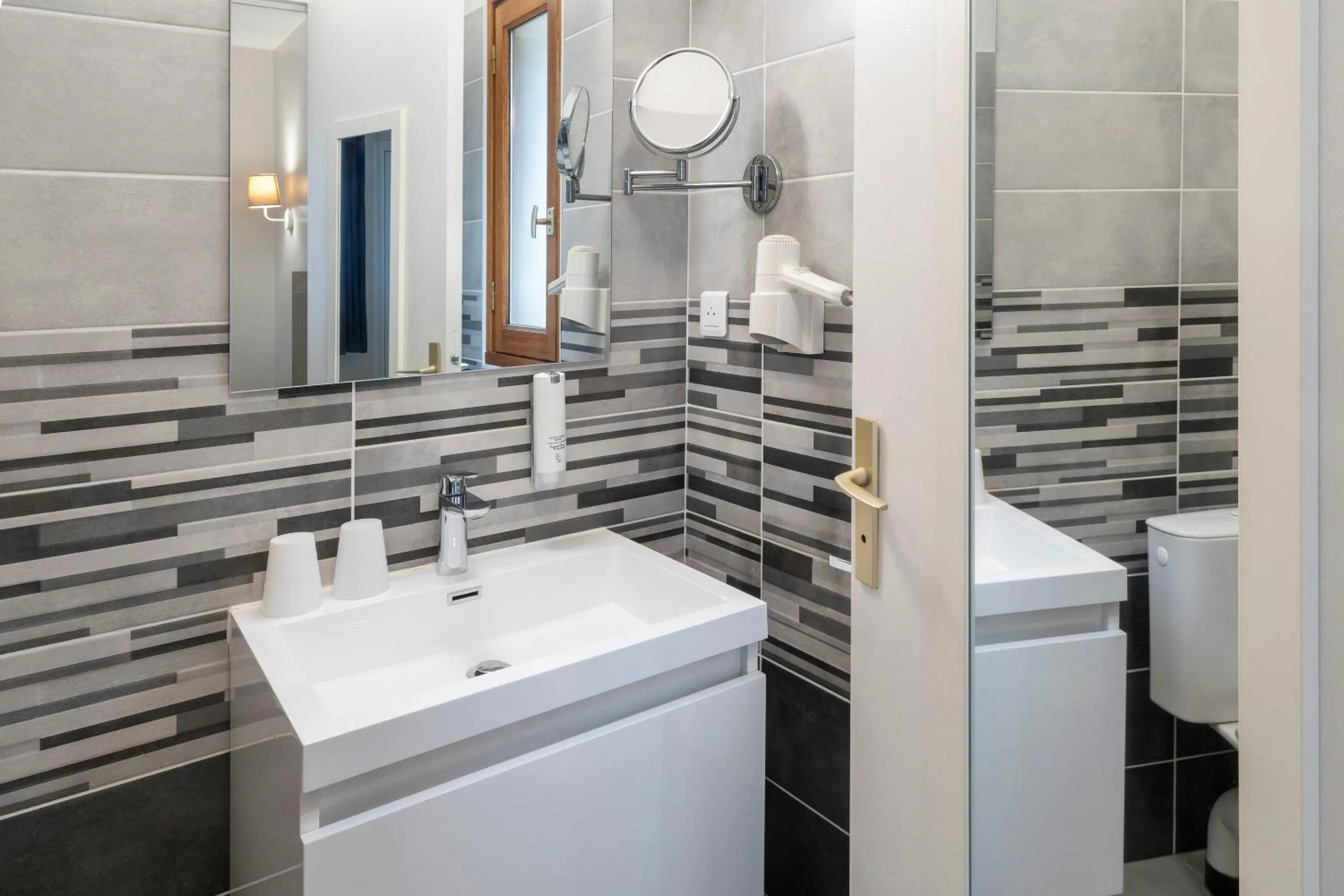 Bathroom in Sure Hotel by Best Western Saintes