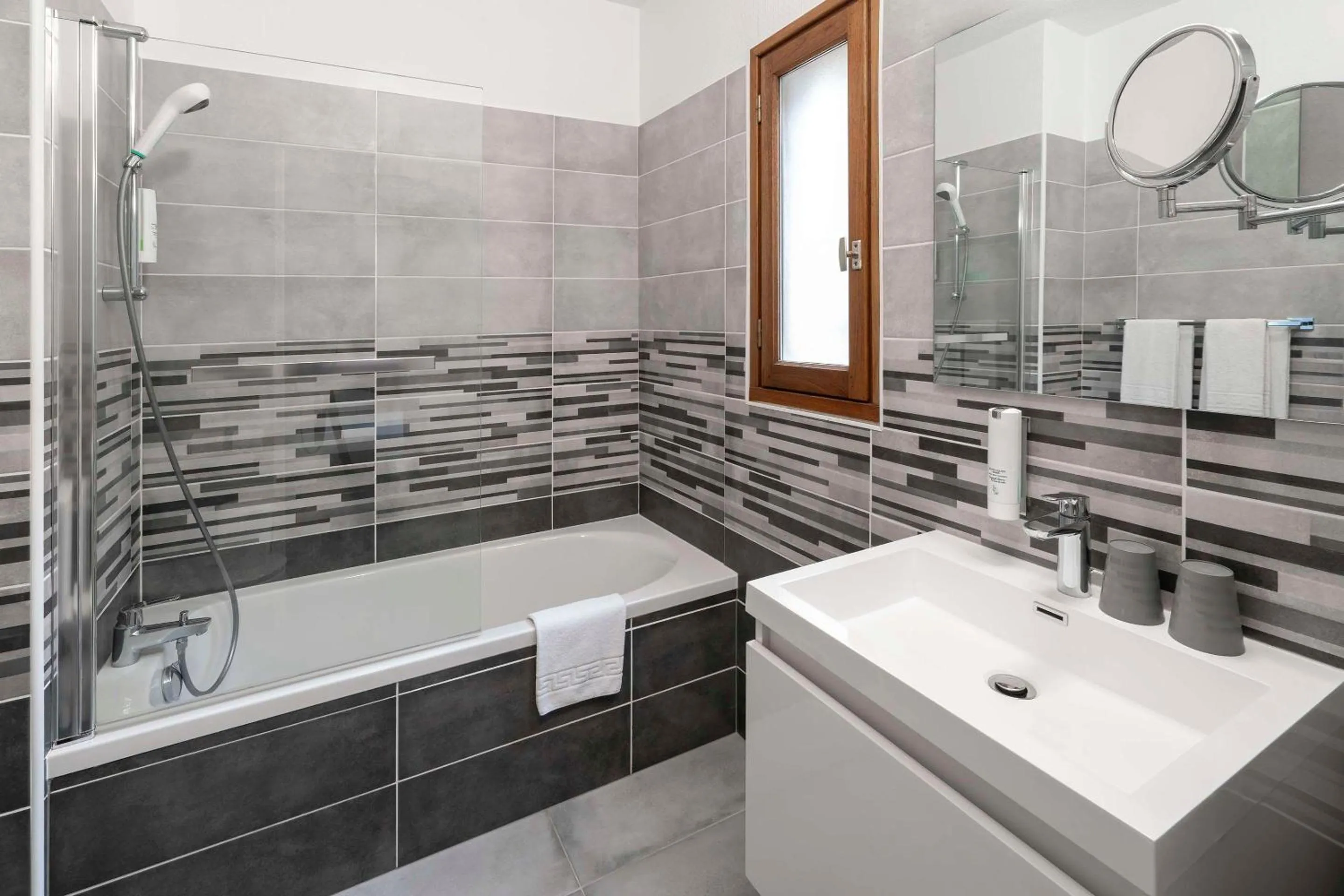 Bathroom in Sure Hotel by Best Western Saintes