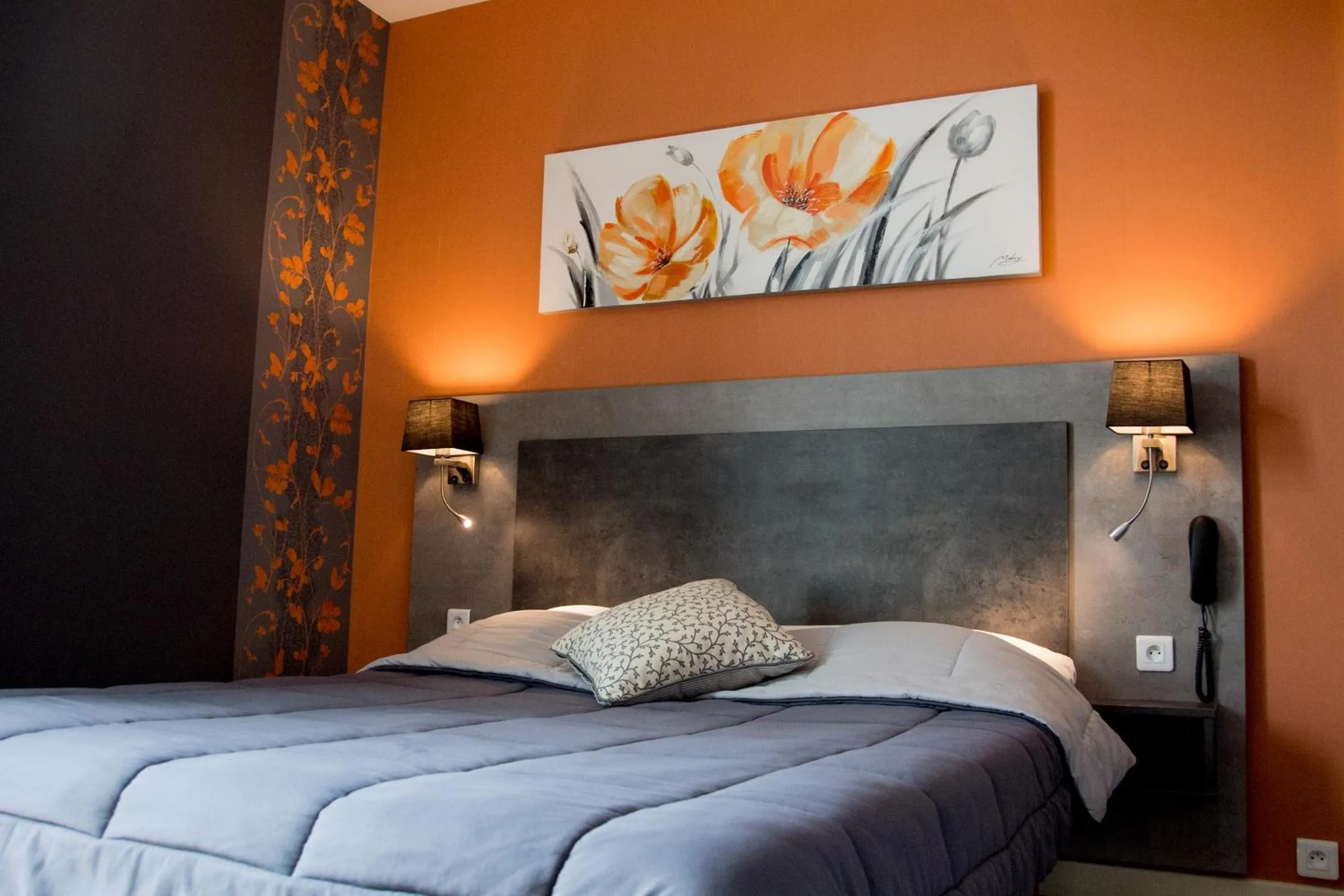 Bed in Hôtel La Croix Blanche