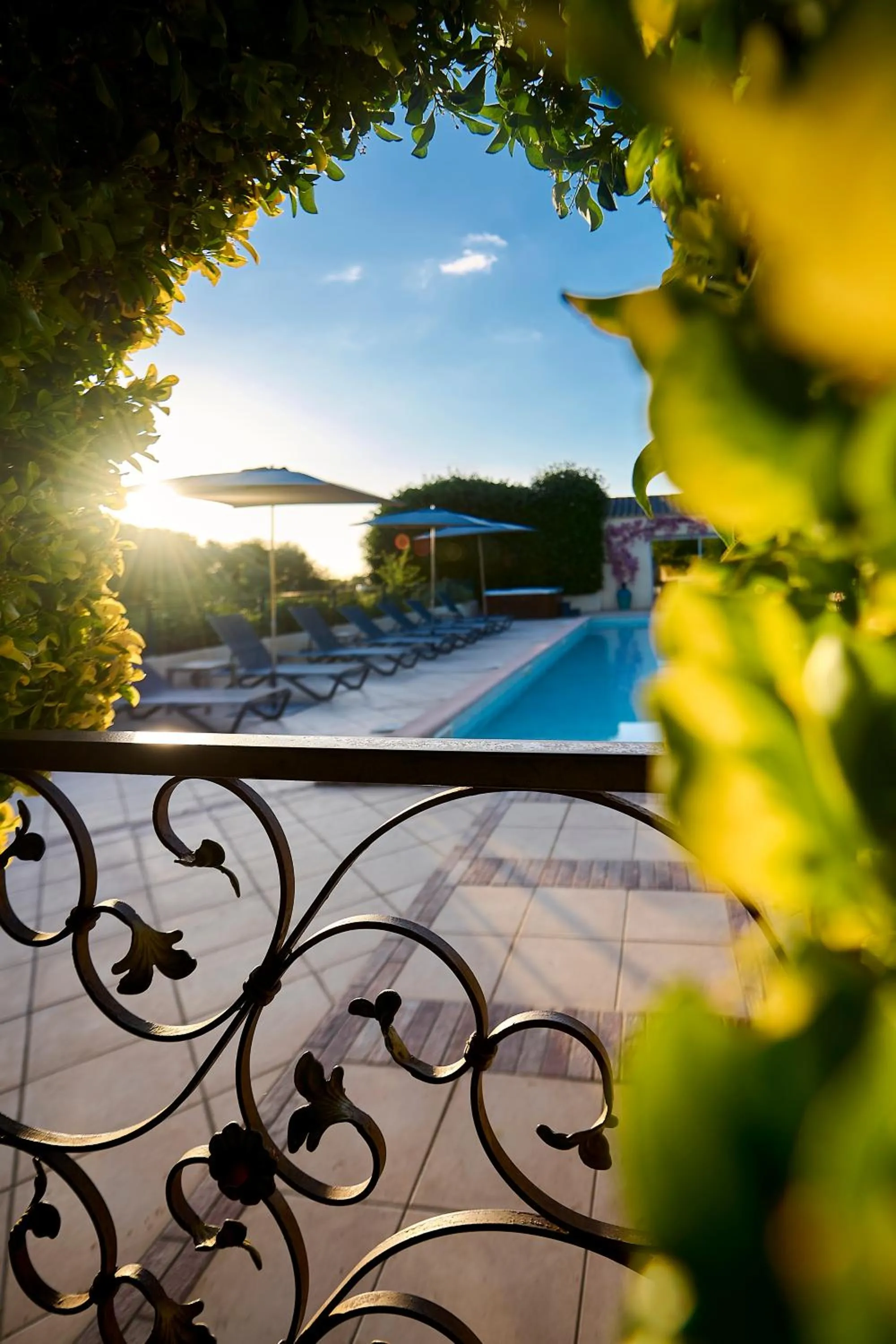 Swimming pool in Hôtel Les Jardins