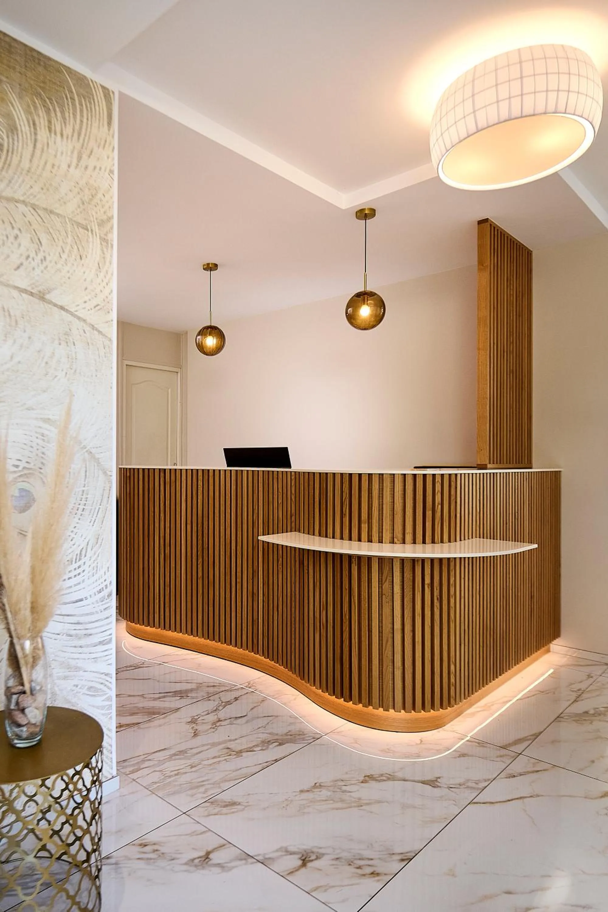 Lobby or reception in Hôtel Les Jardins