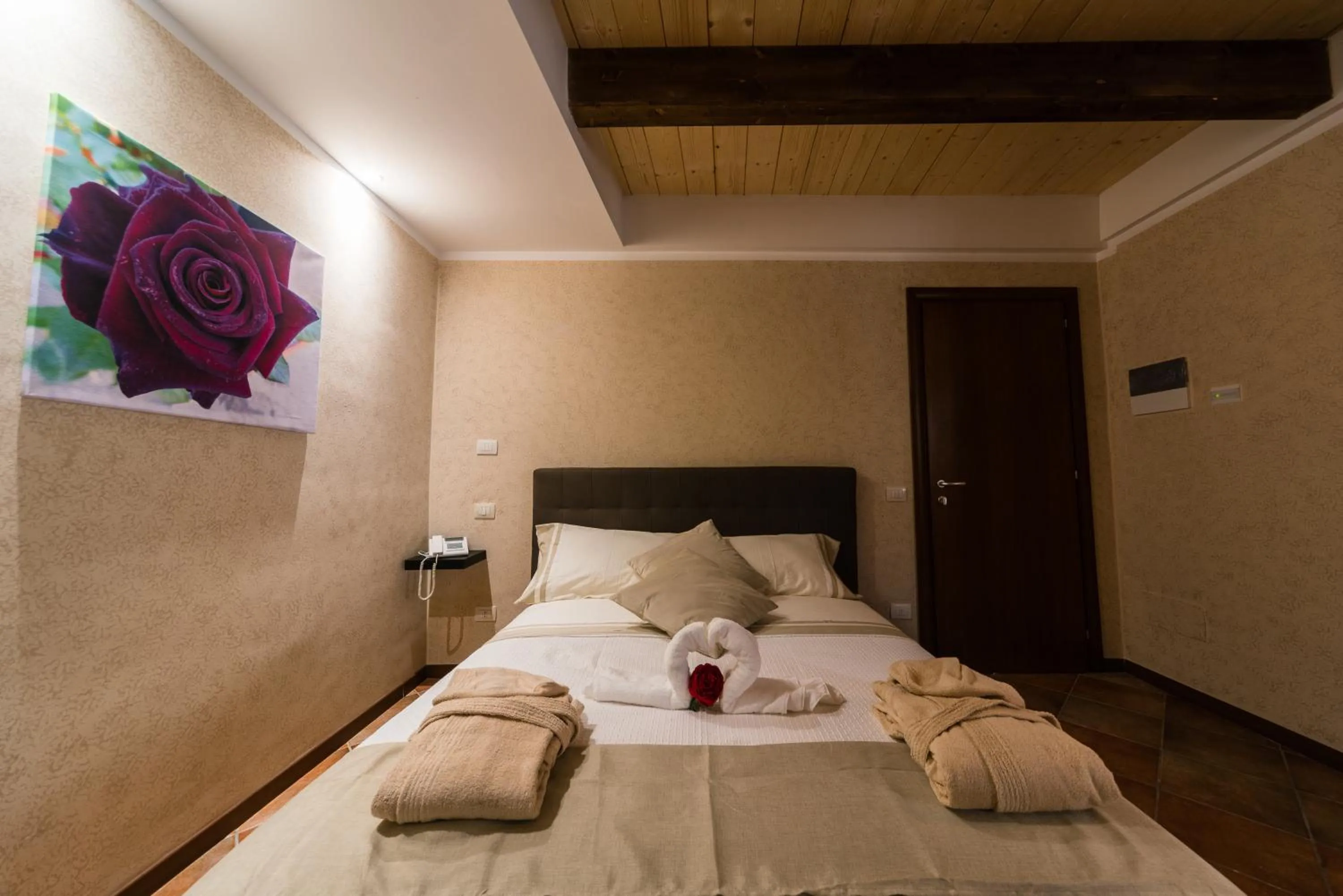 Bed in Le Undici Rose Hotel