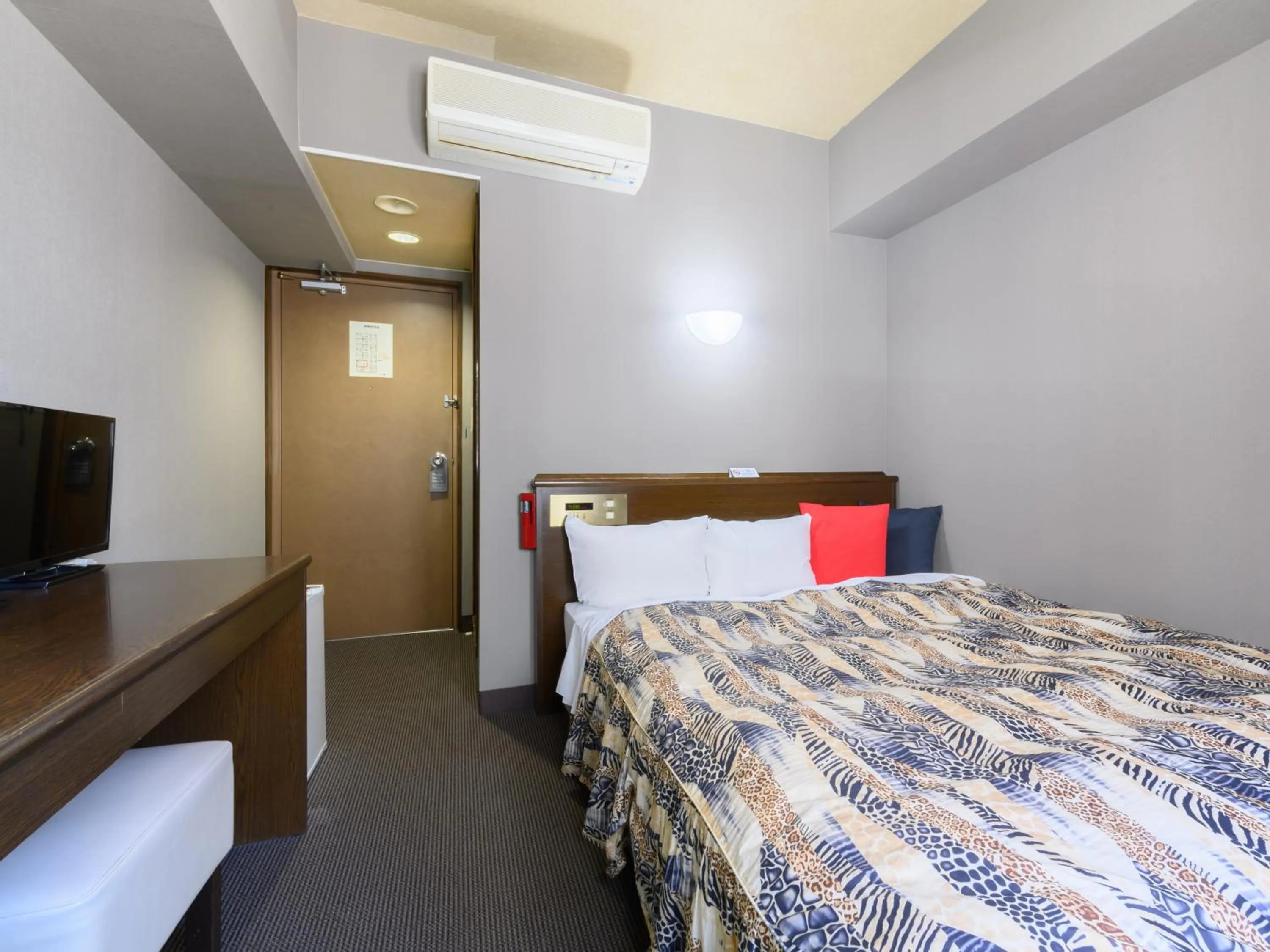 Photo of the whole room, Bed in Tabist IWATA Station Hotel