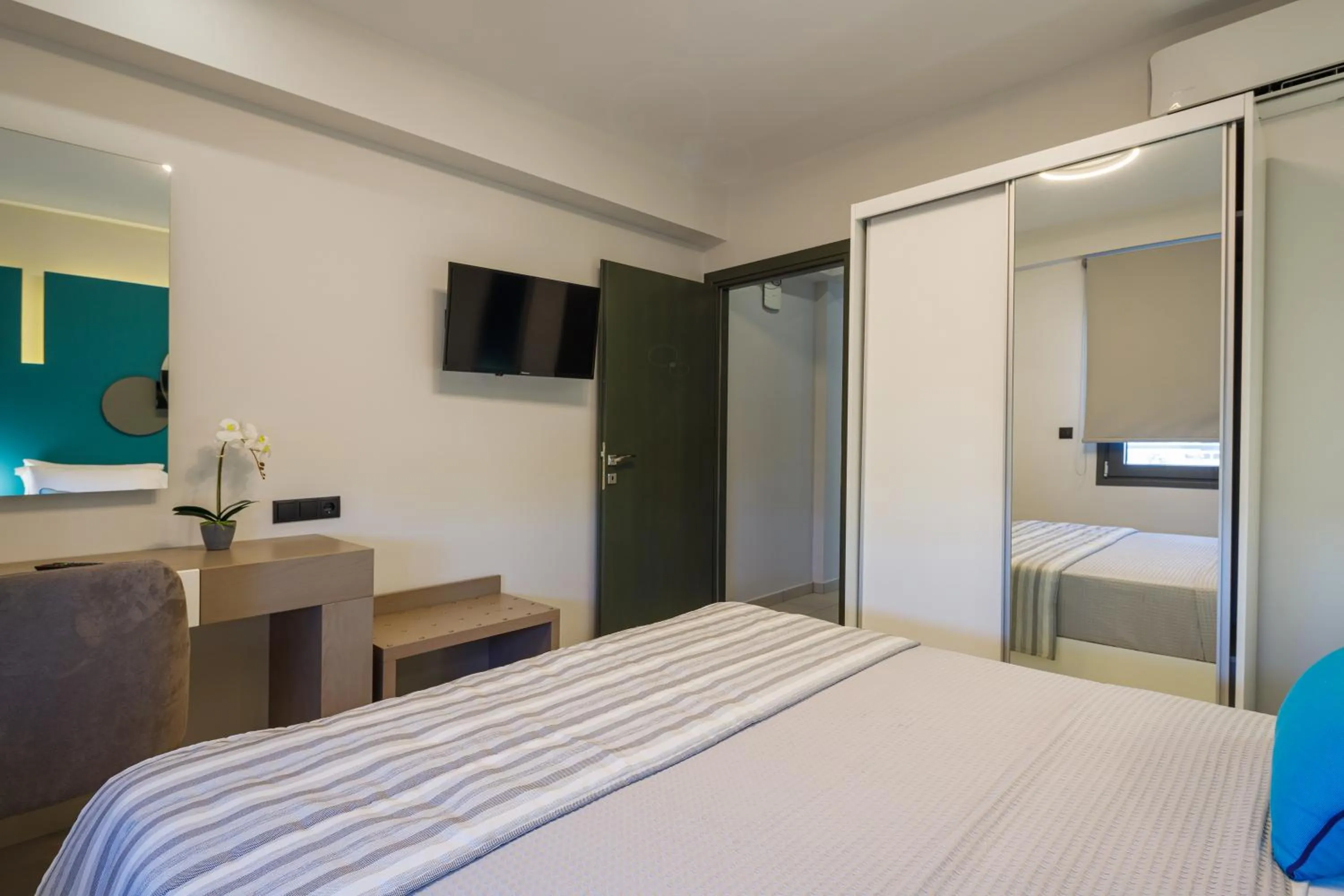 Bed in BISALTAE SEASIDE SUITES