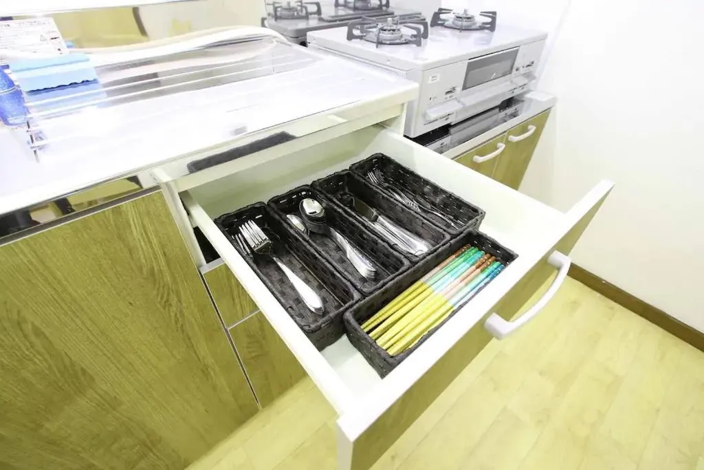 Kitchen or kitchenette in Masaru House