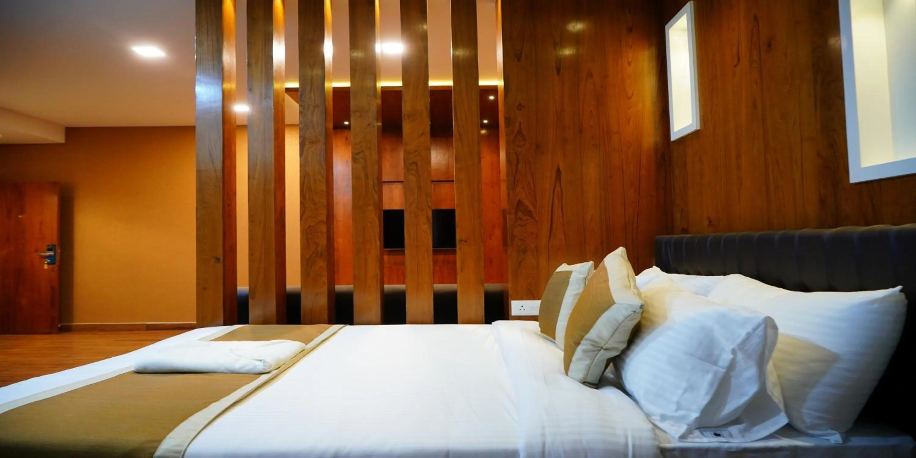 Bed in Nextel Inn, Calicut