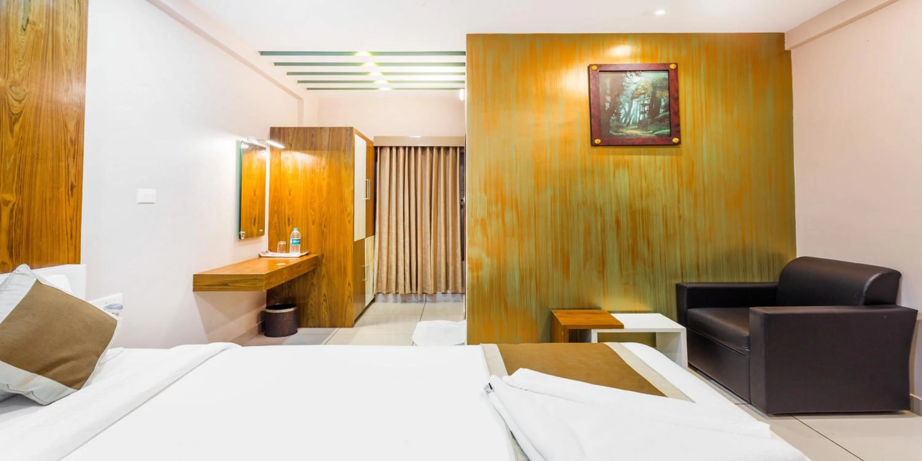 Photo of the whole room, Bed in Nextel Inn, Calicut