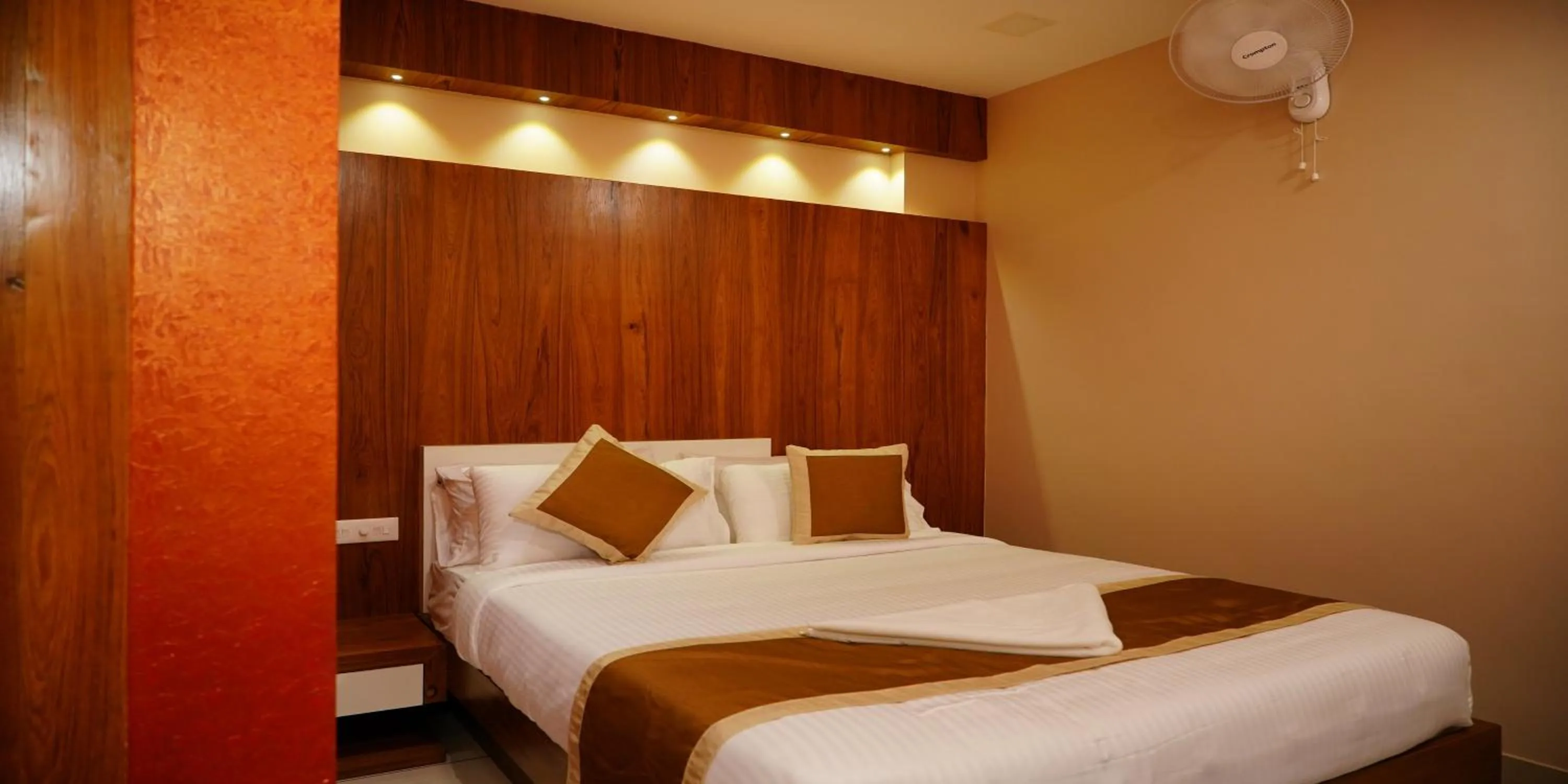 Bed in Nextel Inn, Calicut