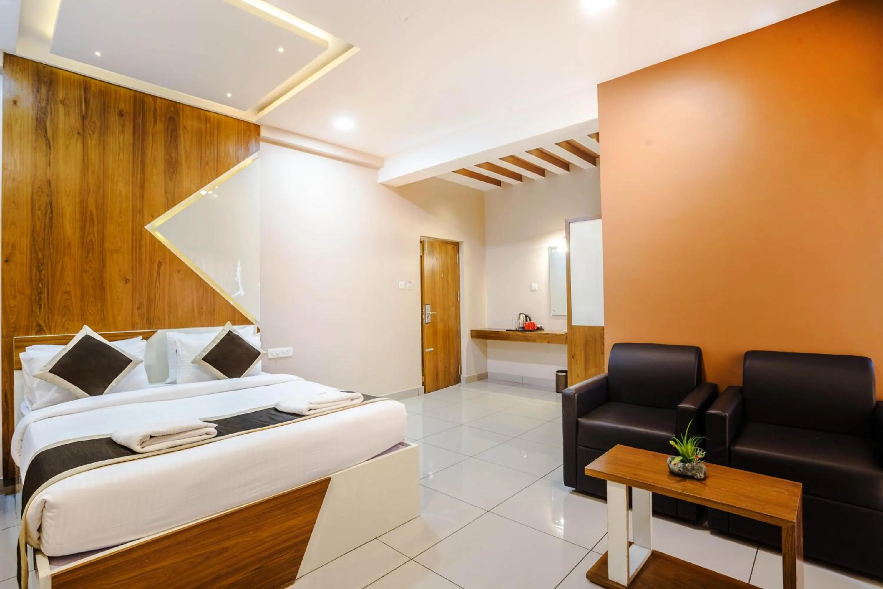 Photo of the whole room, Bed in Nextel Inn, Calicut