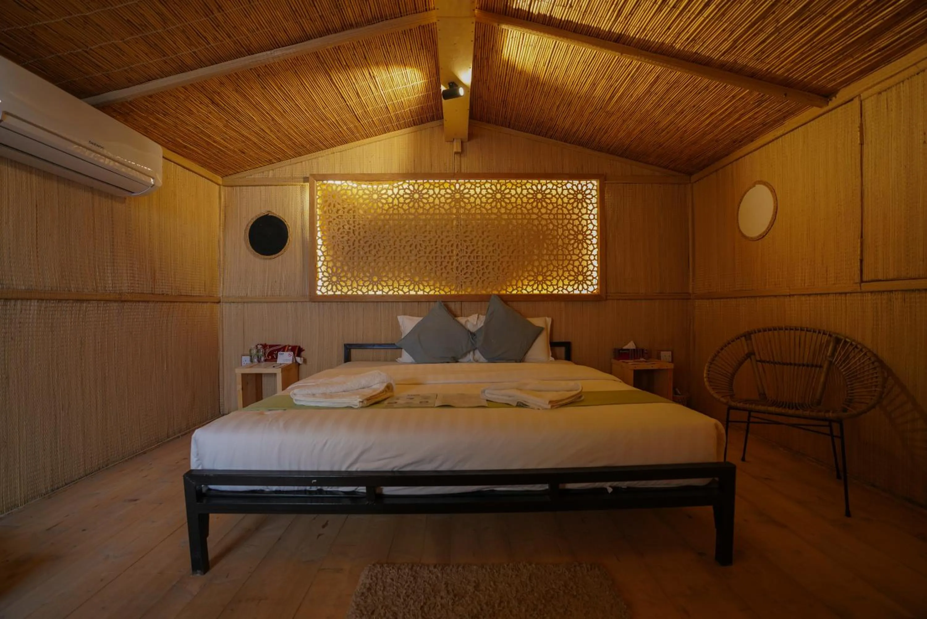 Bed in SAMA Ras Al Jinz Resort