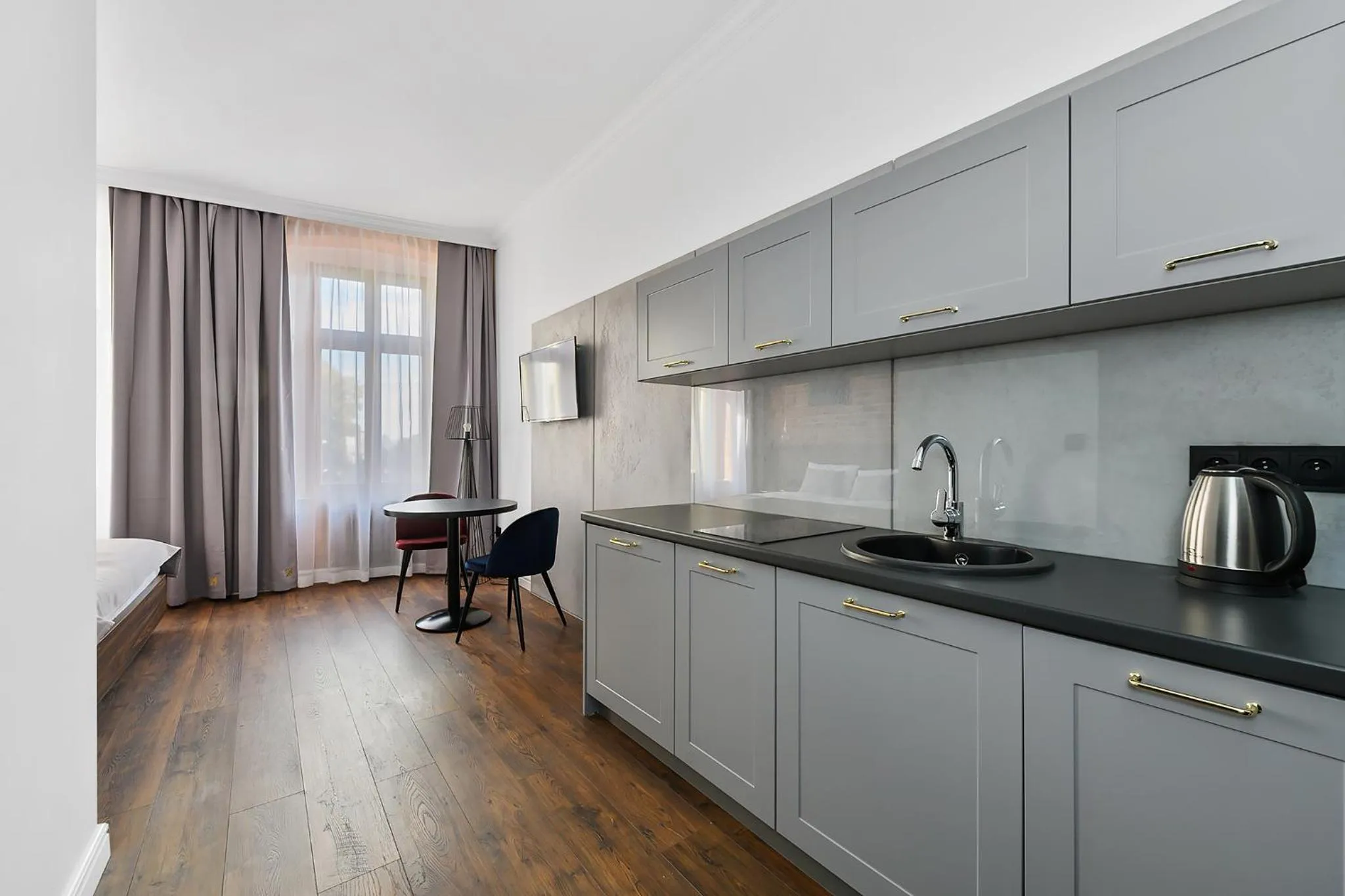 Kitchen or kitchenette in Aparthotel Krzywa Kamienica