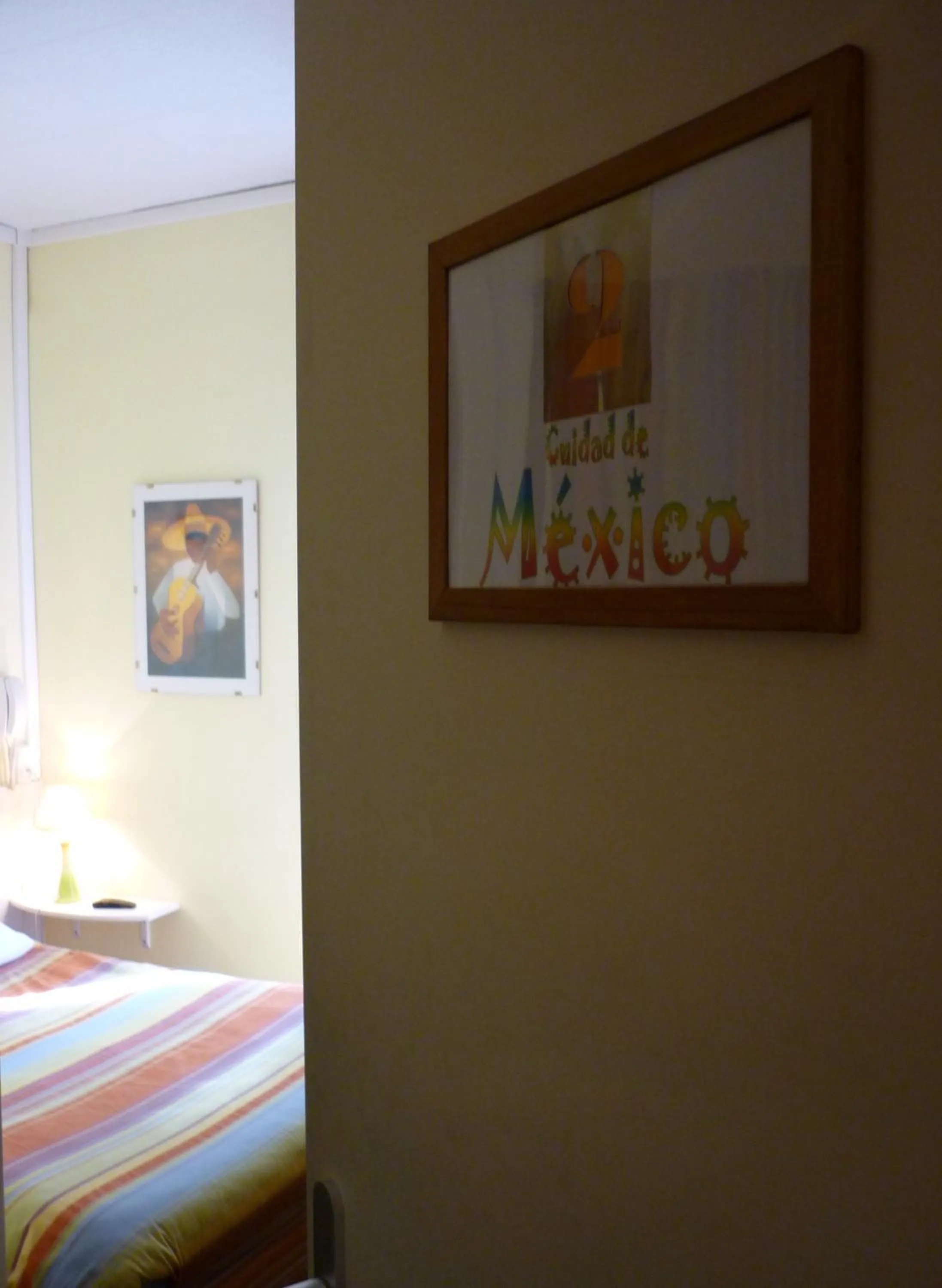 Photo of the whole room, Bed in Hôtel du Centre