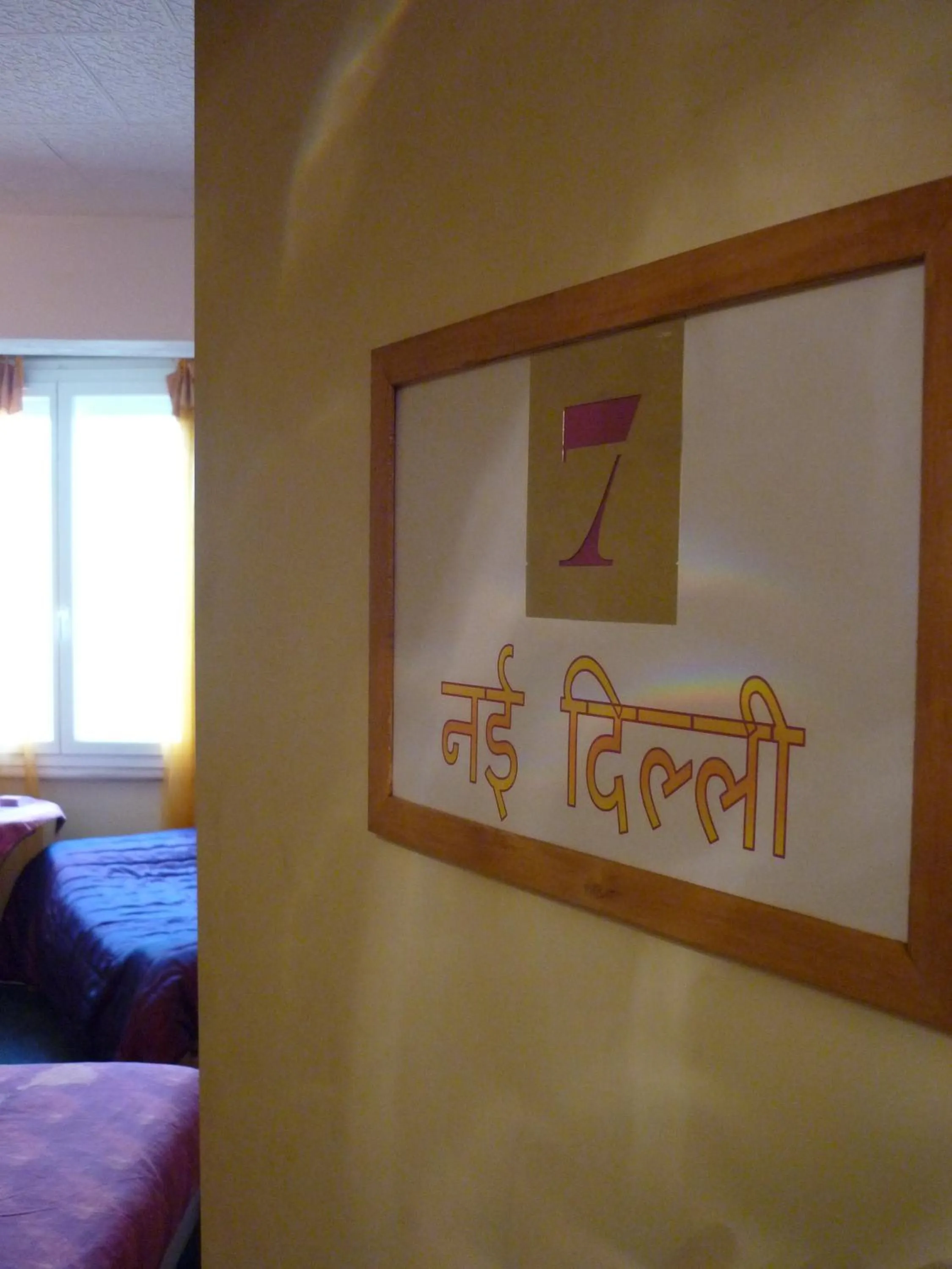 Photo of the whole room, Bed in Hôtel du Centre