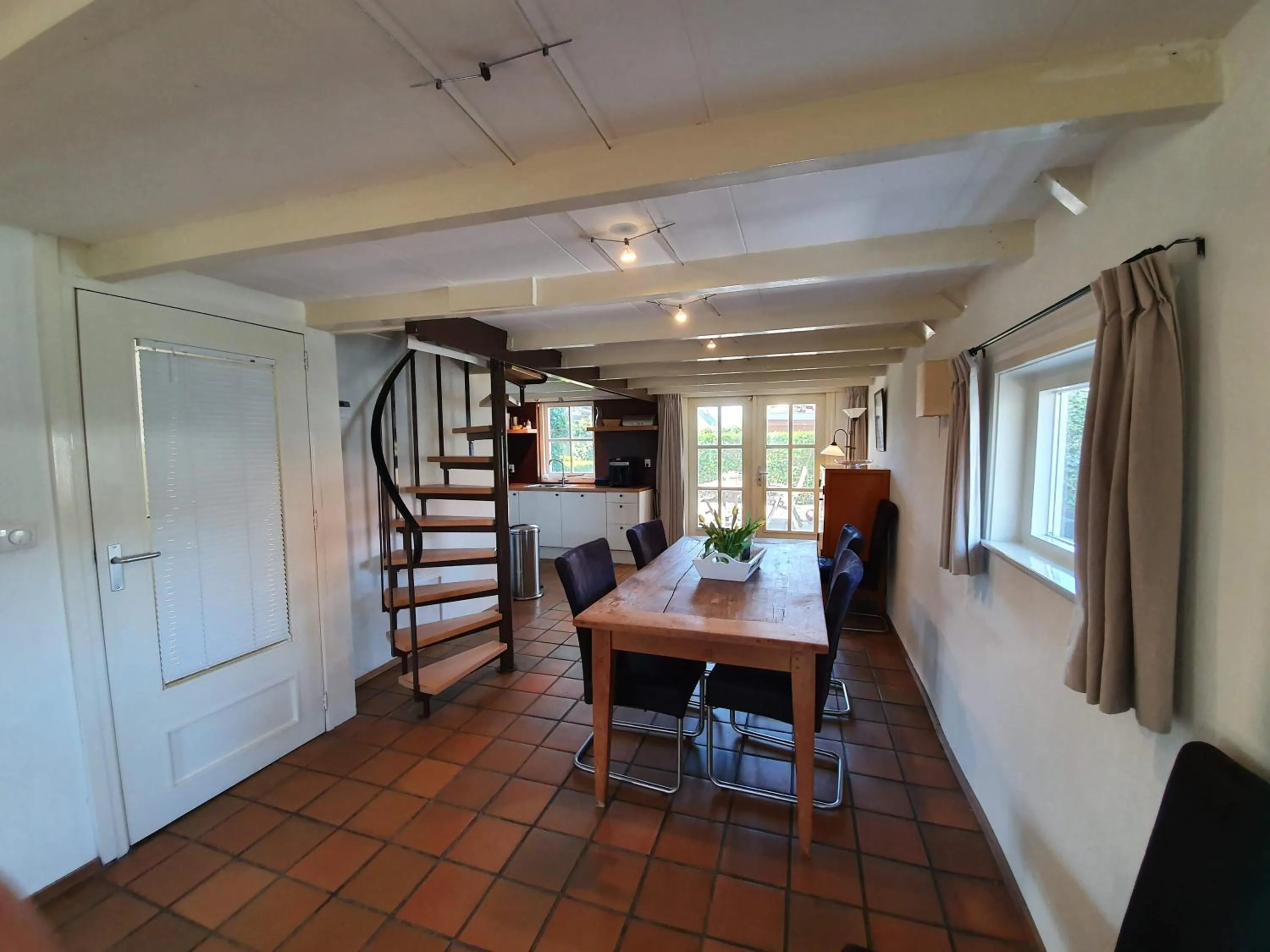 Dining area in d'Oude Herbergh, vakantiehuizen aan het water