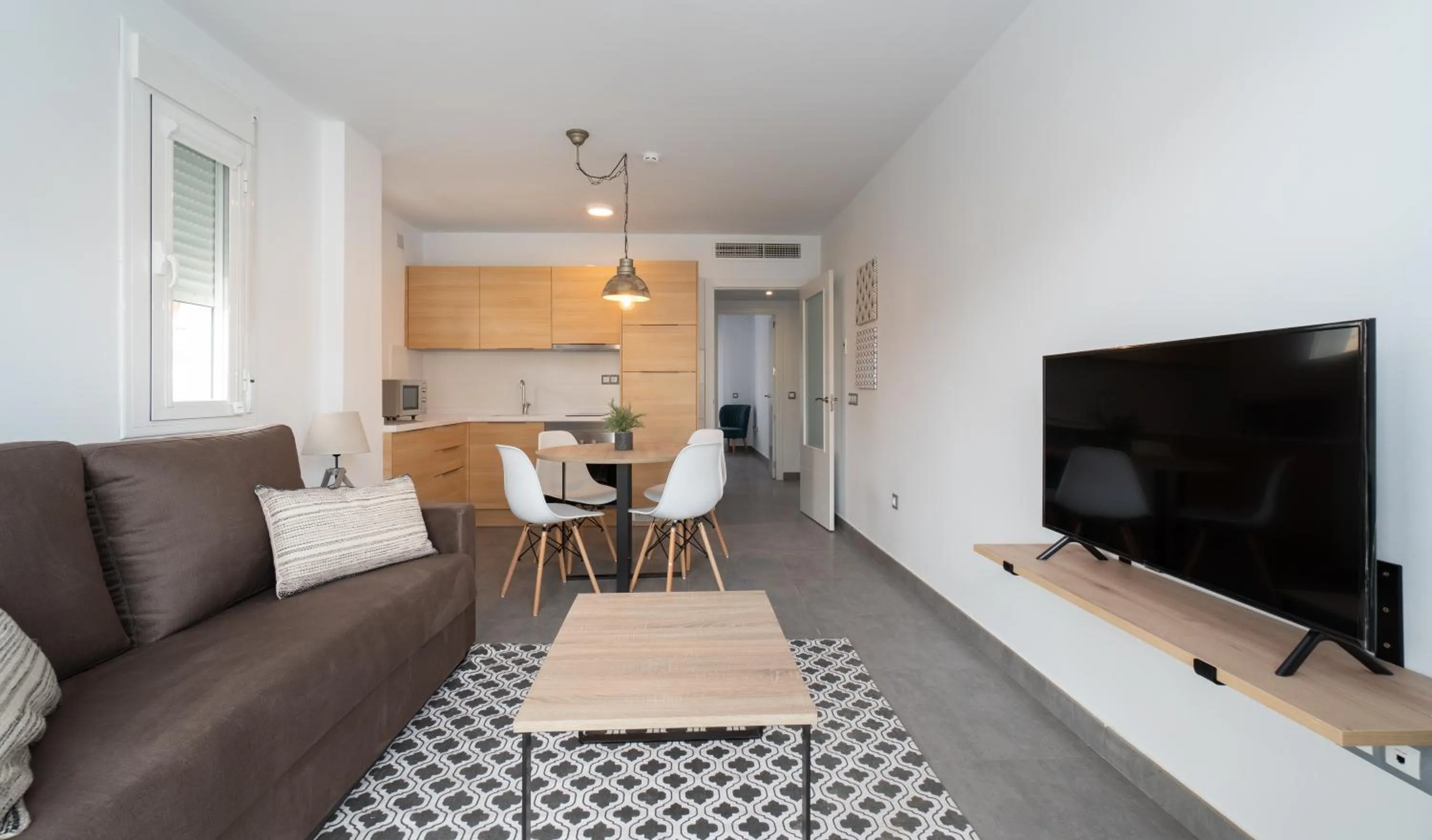 TV and multimedia in Sur Suites La Dorada, centricos soleados a pocos metros de la Playa y con Parking Opcional