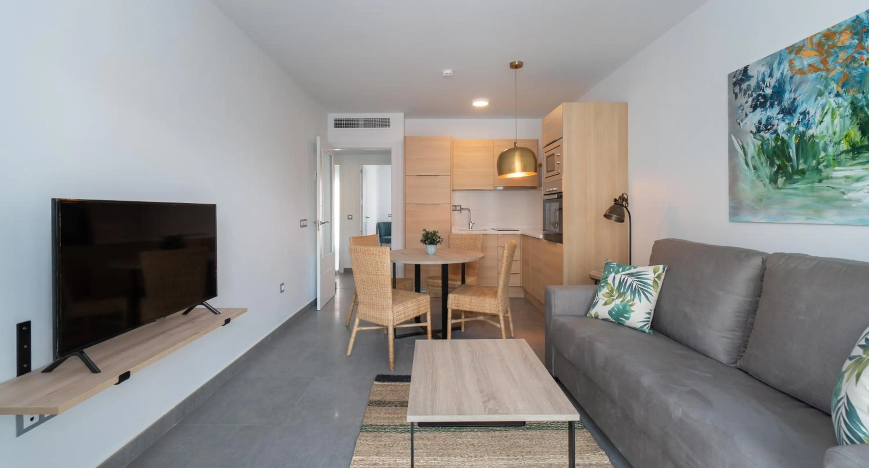 TV and multimedia in Sur Suites La Dorada, centricos soleados a pocos metros de la Playa y con Parking Opcional